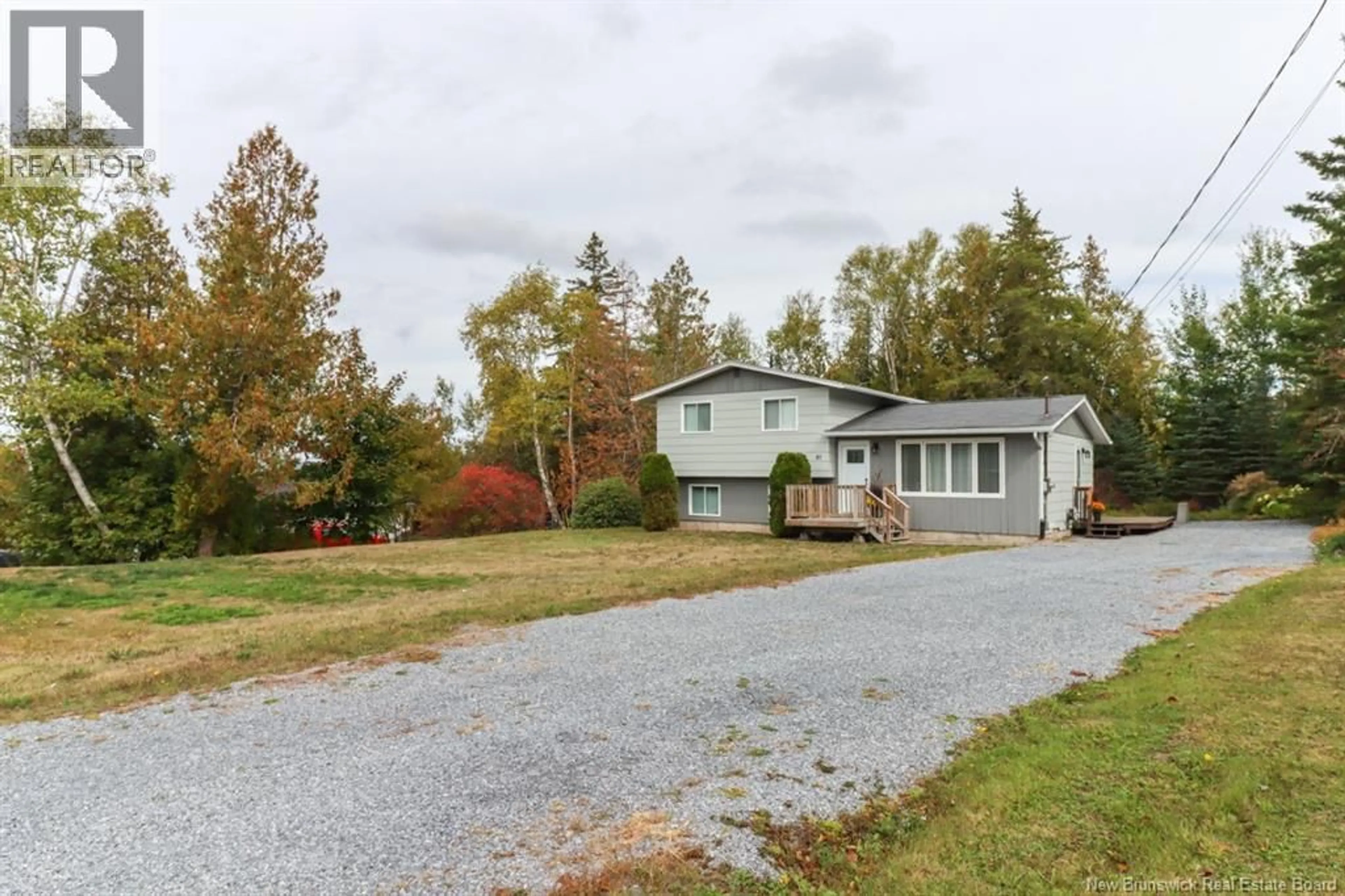 A pic from outside/outdoor area/front of a property/back of a property/a pic from drone, street for 87 STOCK FARM ROAD, Quispamsis New Brunswick E2G2A2