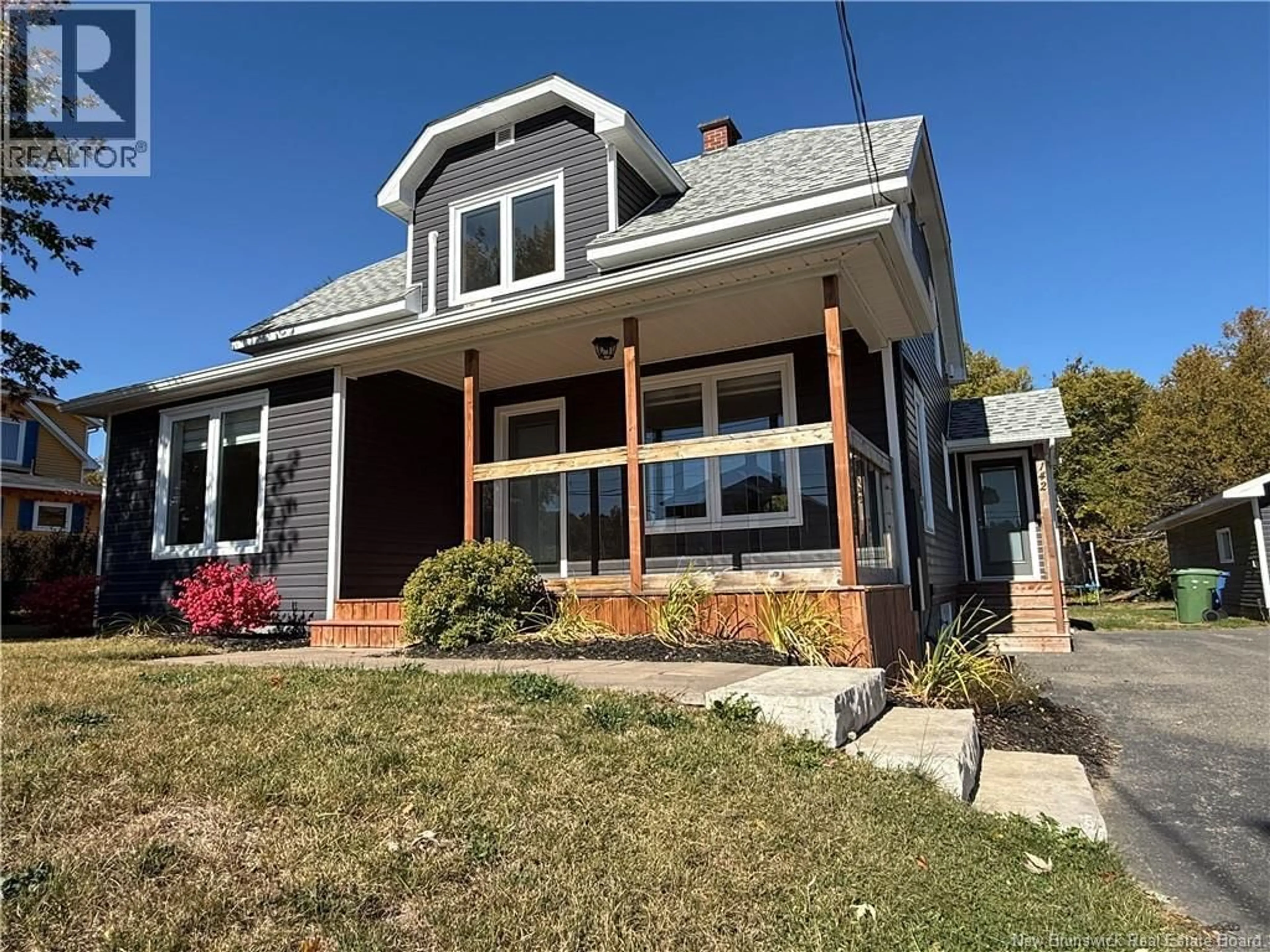 Home with vinyl exterior material, street for 142 RUE LAPLANTE O, Petit-Rocher New Brunswick E8J1T1