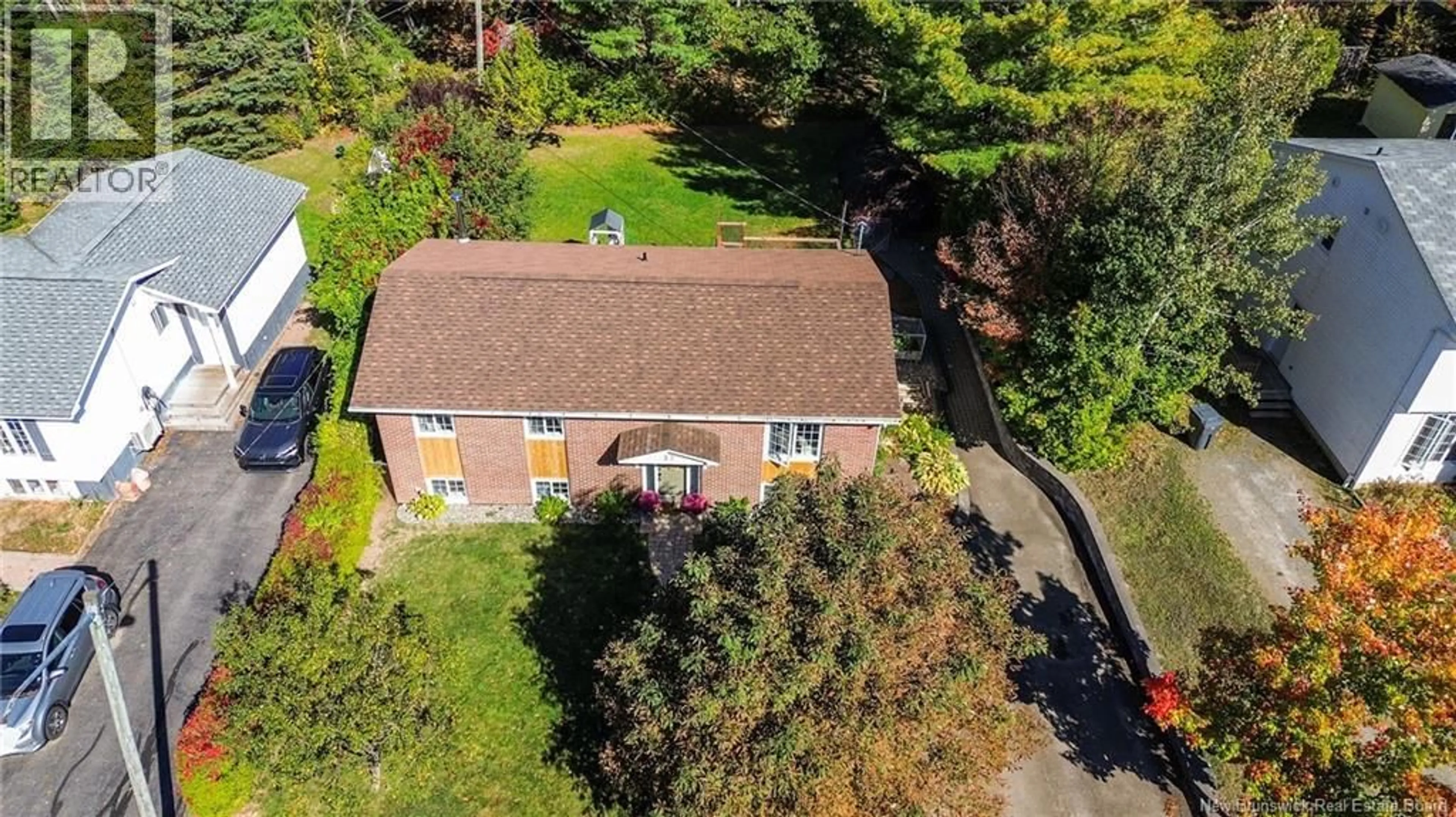 A pic from outside/outdoor area/front of a property/back of a property/a pic from drone, street for 32 BRADLEY AVENUE, New Maryland New Brunswick E3C1C4