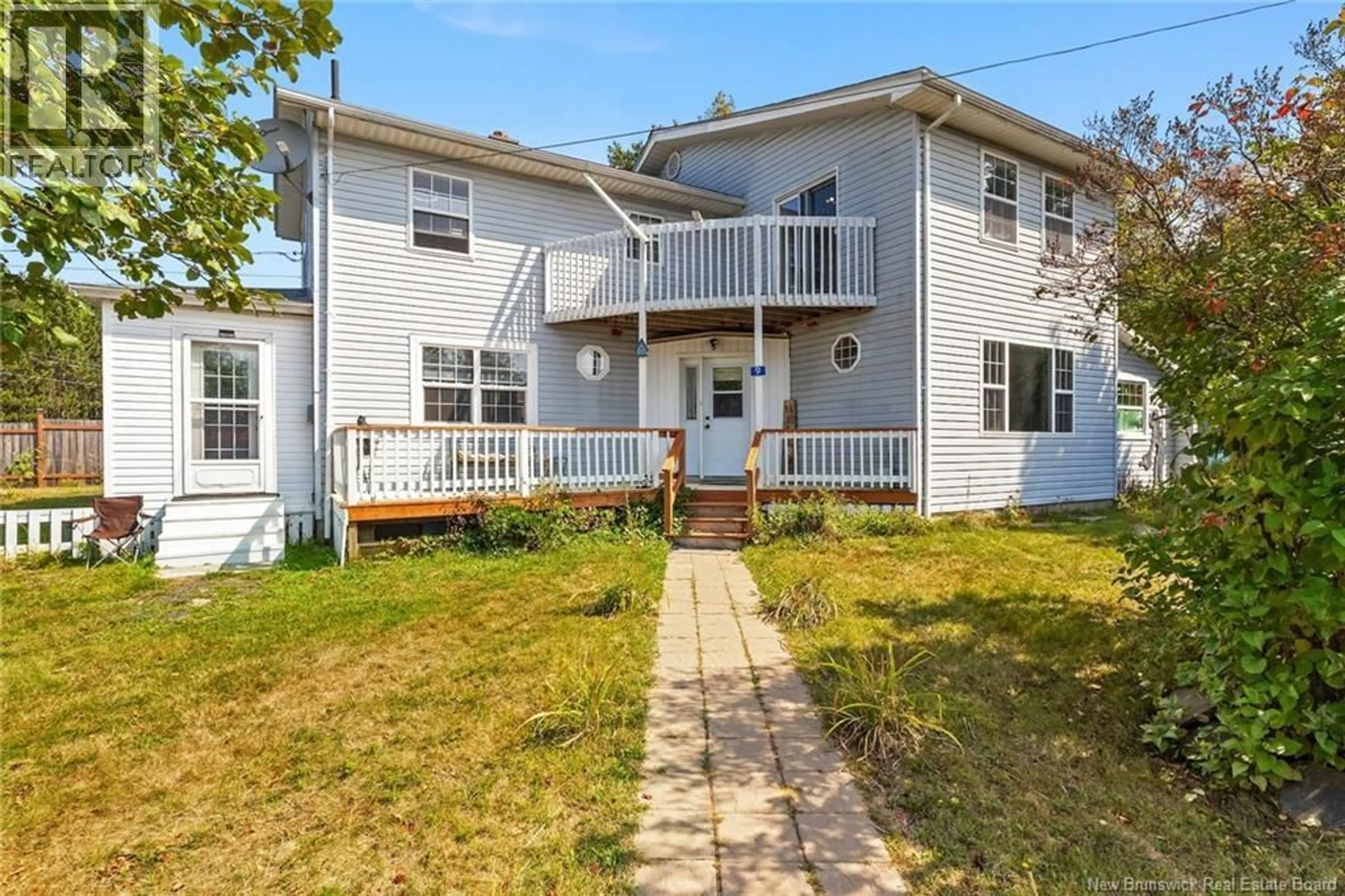 Home with vinyl exterior material, street for 9 SPRUCE STREET, Chipman New Brunswick E4A1Z1
