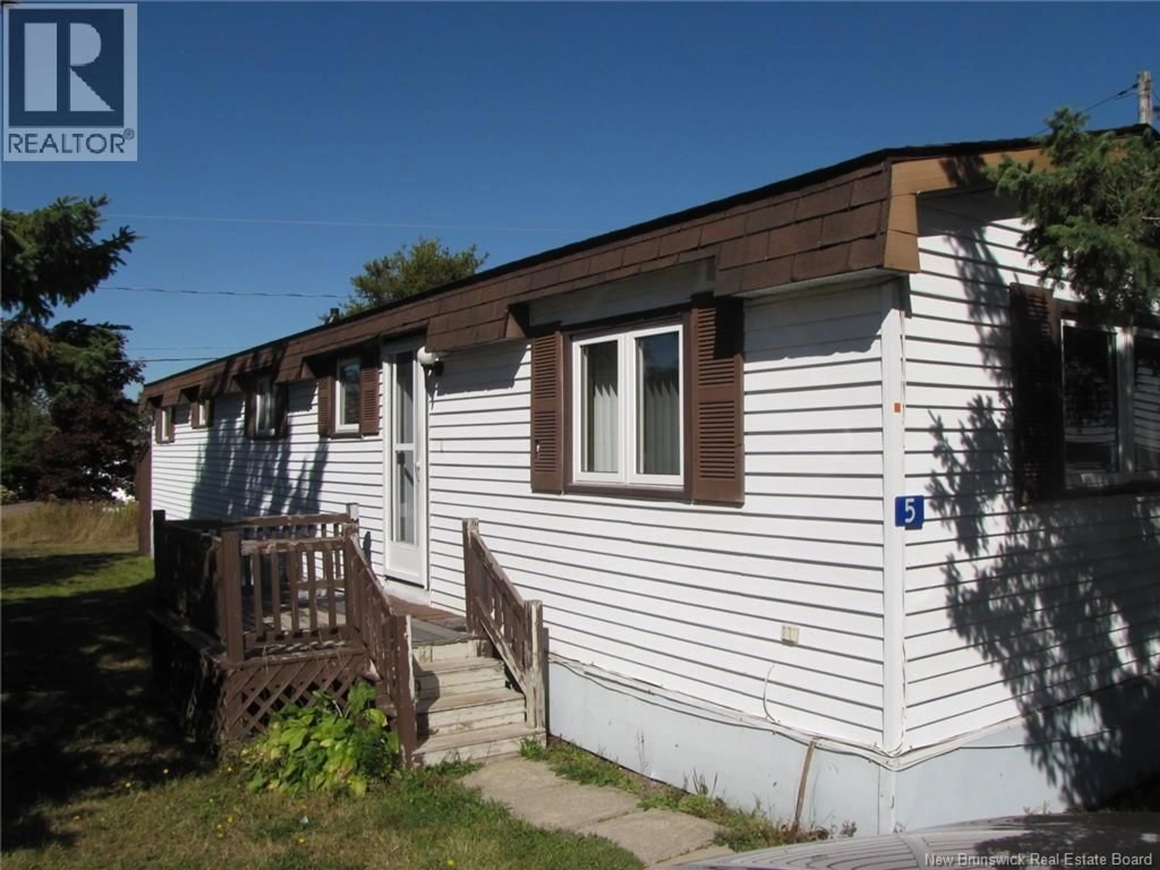 Home with vinyl exterior material, street for 5 THIRD STREET, Moncton New Brunswick E1H1K6