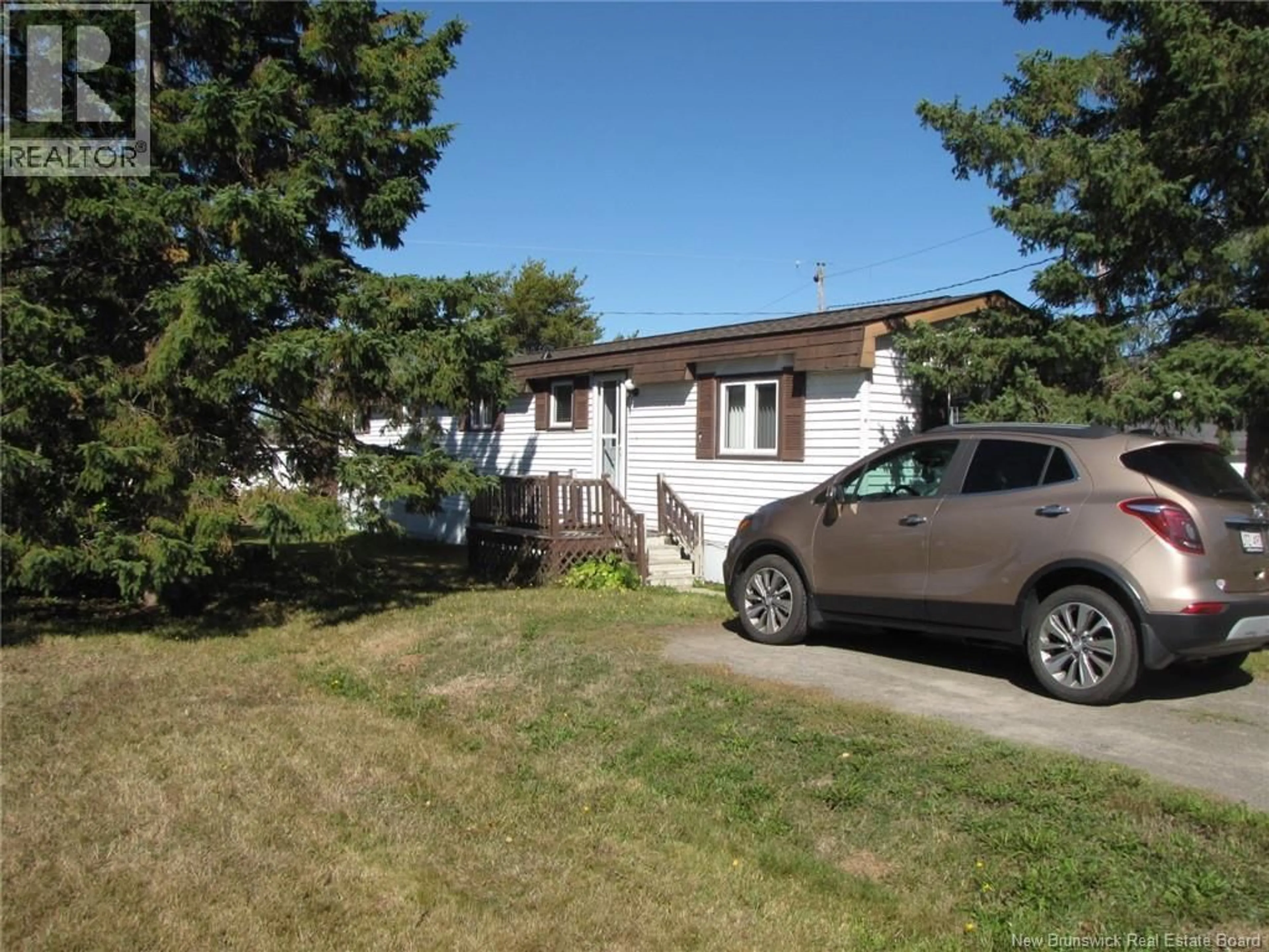 Home with vinyl exterior material, street for 5 THIRD STREET, Moncton New Brunswick E1H1K6