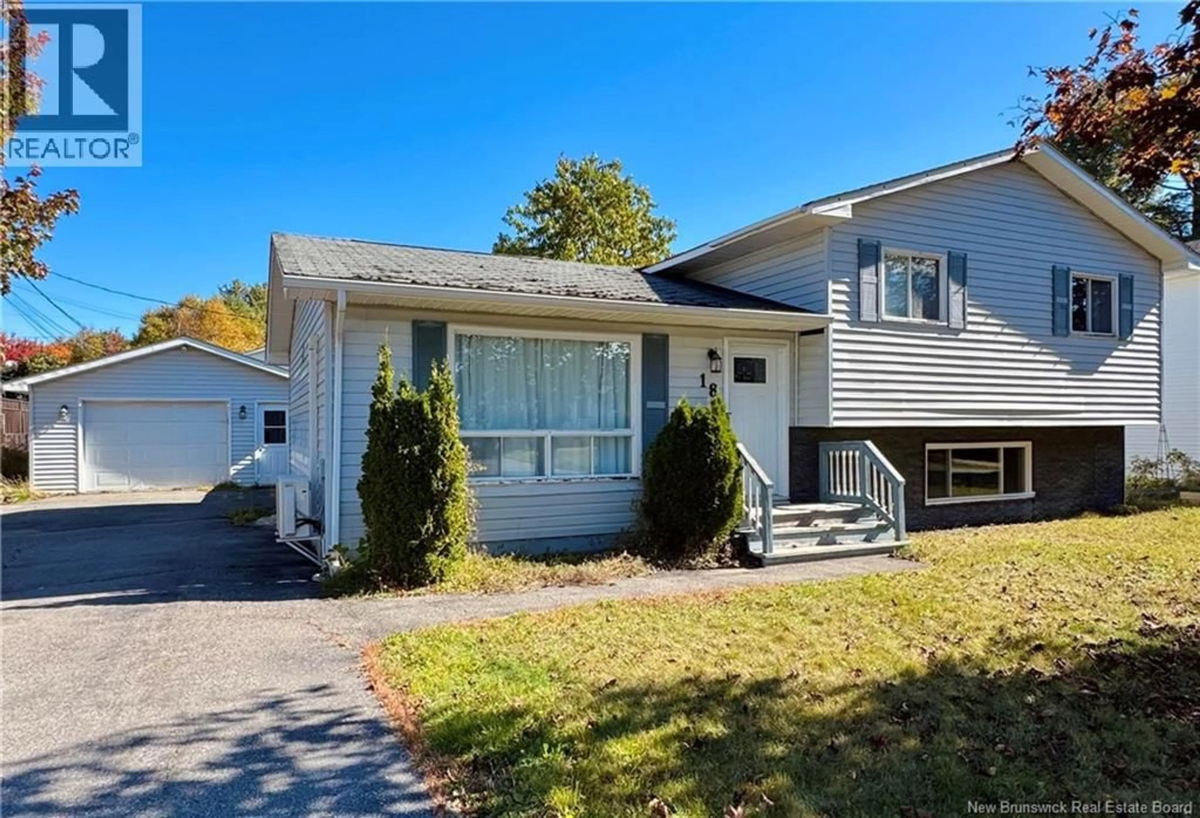 Home with vinyl exterior material, street for 18 LOCKE STREET, Miramichi New Brunswick E1V3X7