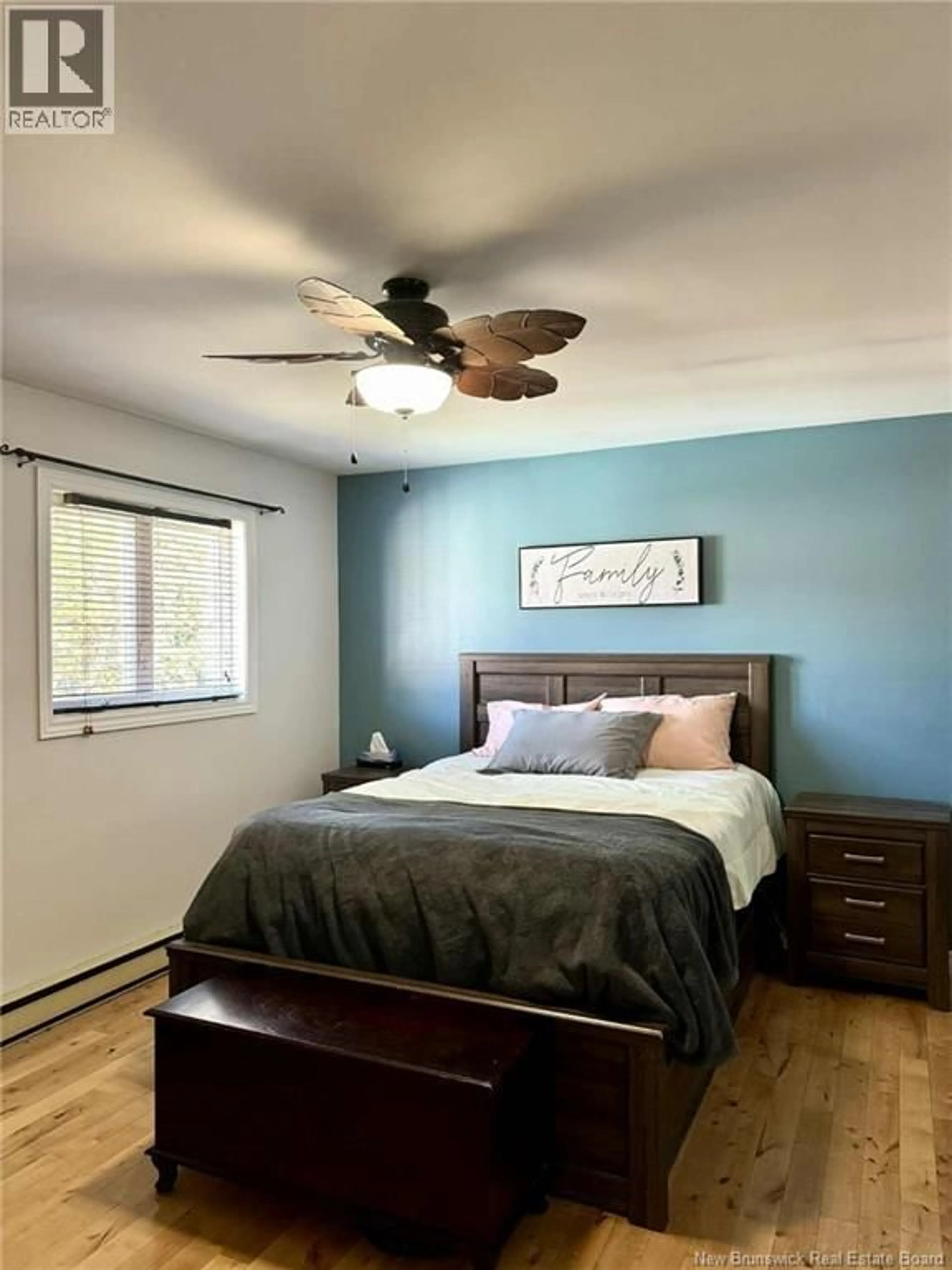 Bedroom with bed, wood/laminate floor for 18 LOCKE STREET, Miramichi New Brunswick E1V3X7