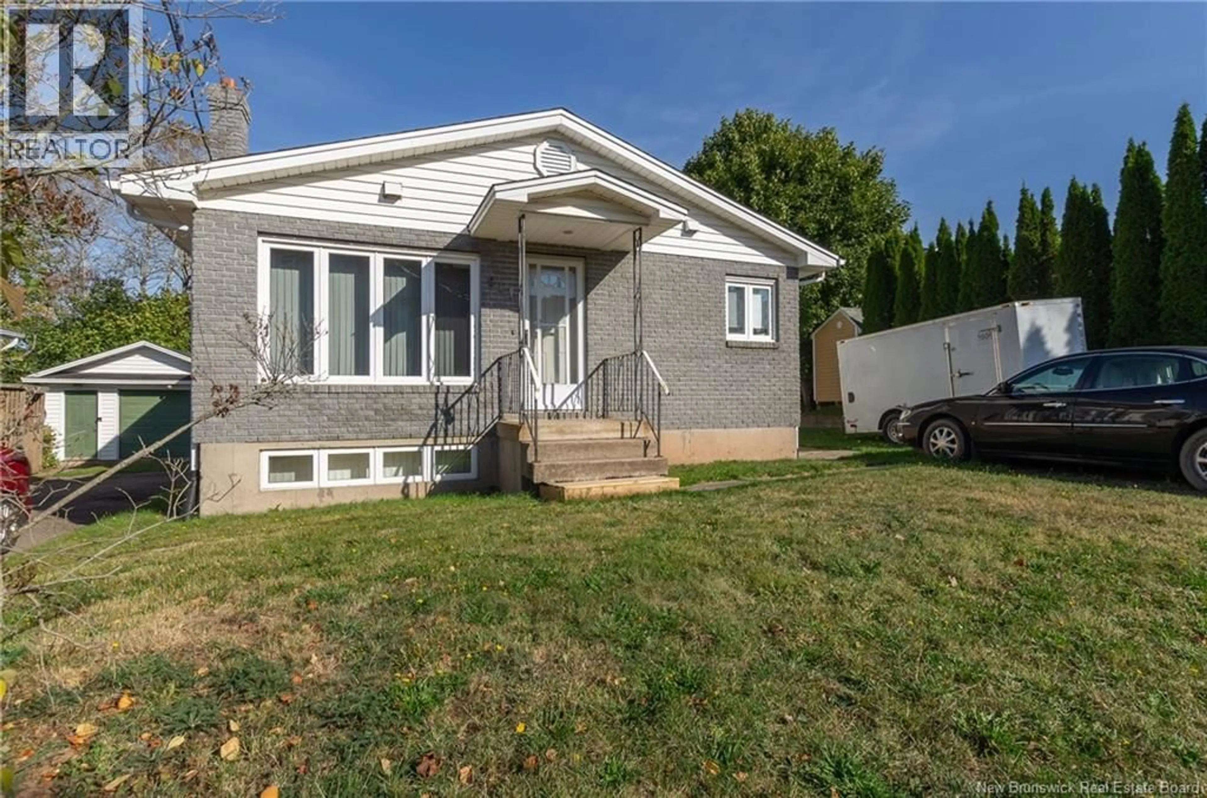 Home with vinyl exterior material, street for 611 HIGH STREET, Moncton New Brunswick E1C6G3