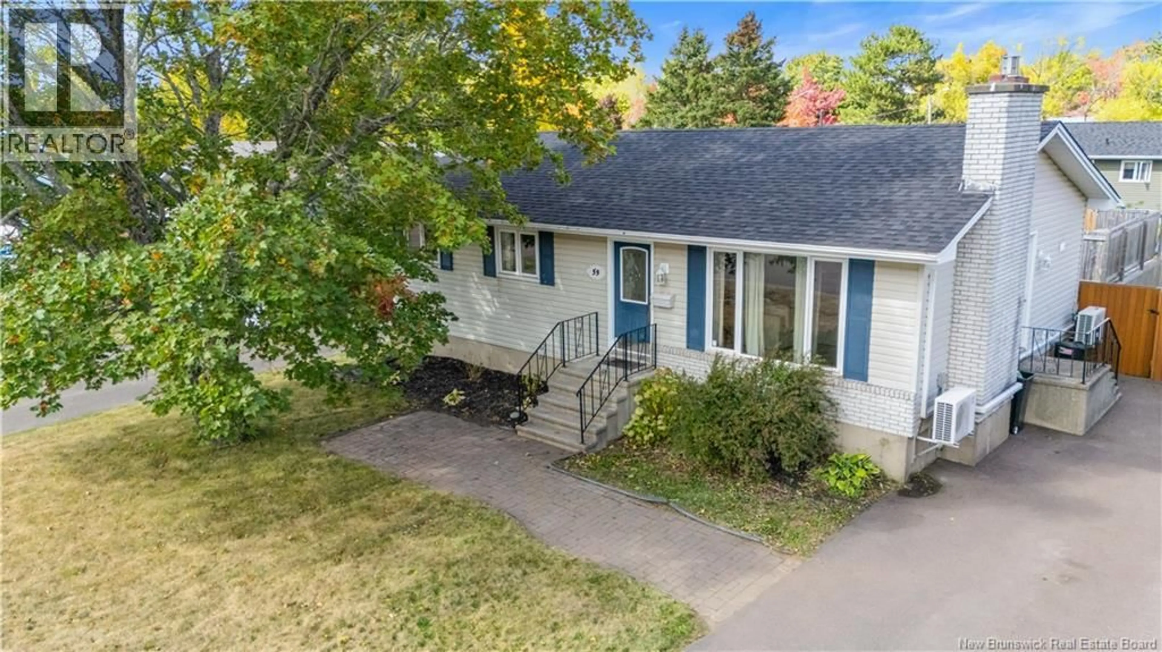 A pic from outside/outdoor area/front of a property/back of a property/a pic from drone, street for 59 WYNWOOD DRIVE, Moncton New Brunswick E1A2M2