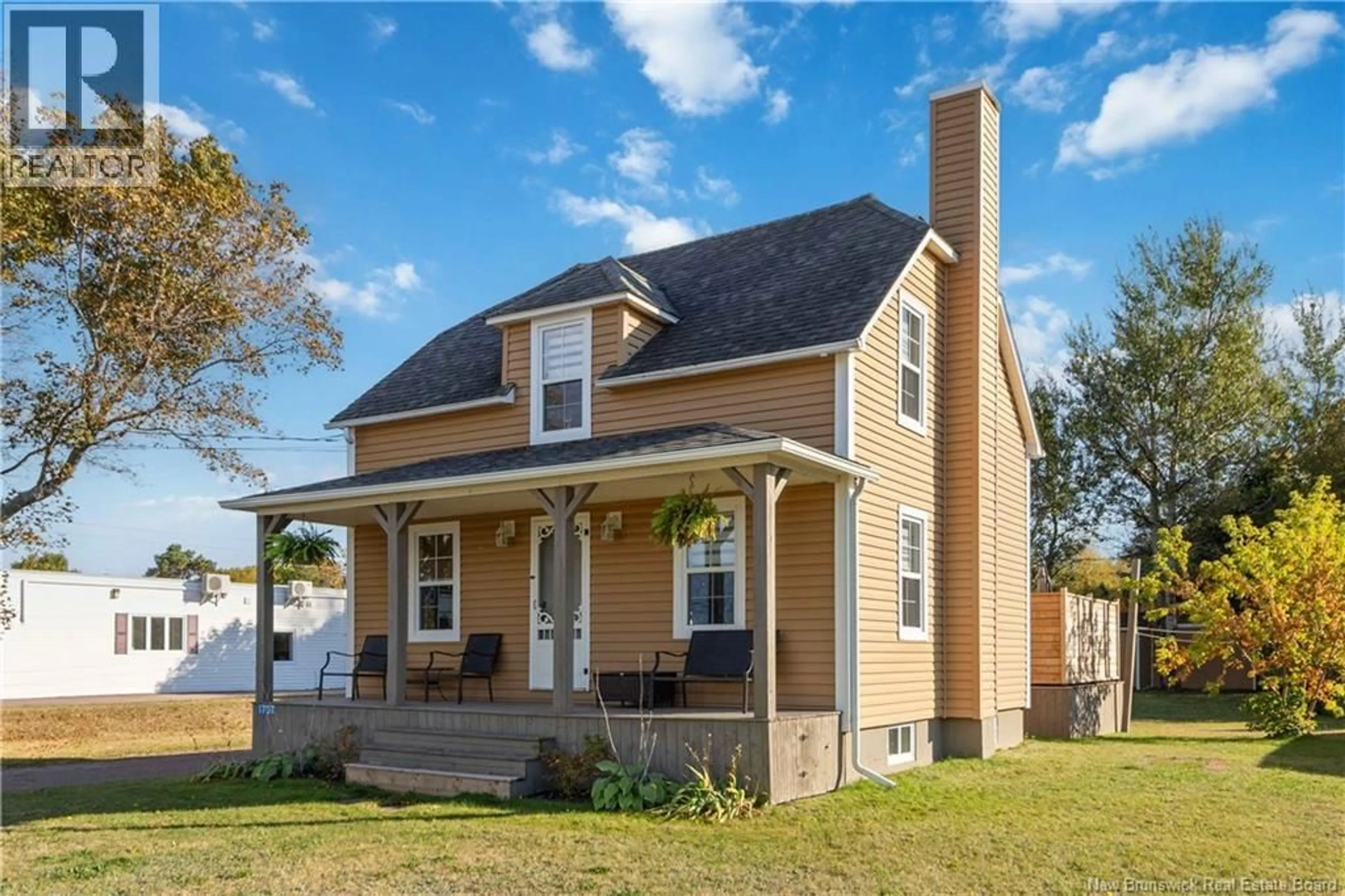 Home with vinyl exterior material, street for 1707 ROUTE 133, Grand-Barachois New Brunswick E4P8H8