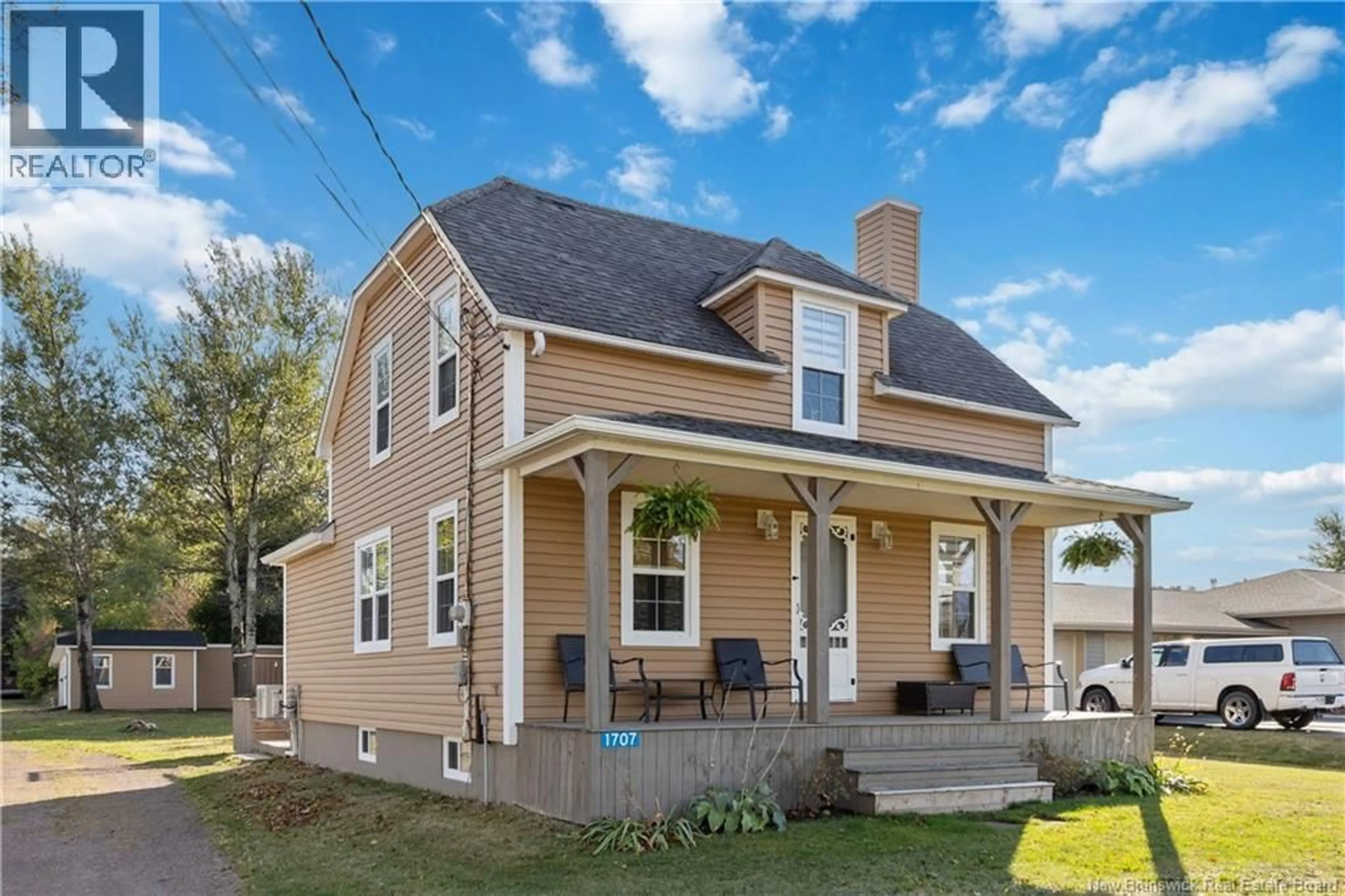 Home with vinyl exterior material, street for 1707 ROUTE 133, Grand-Barachois New Brunswick E4P8H8