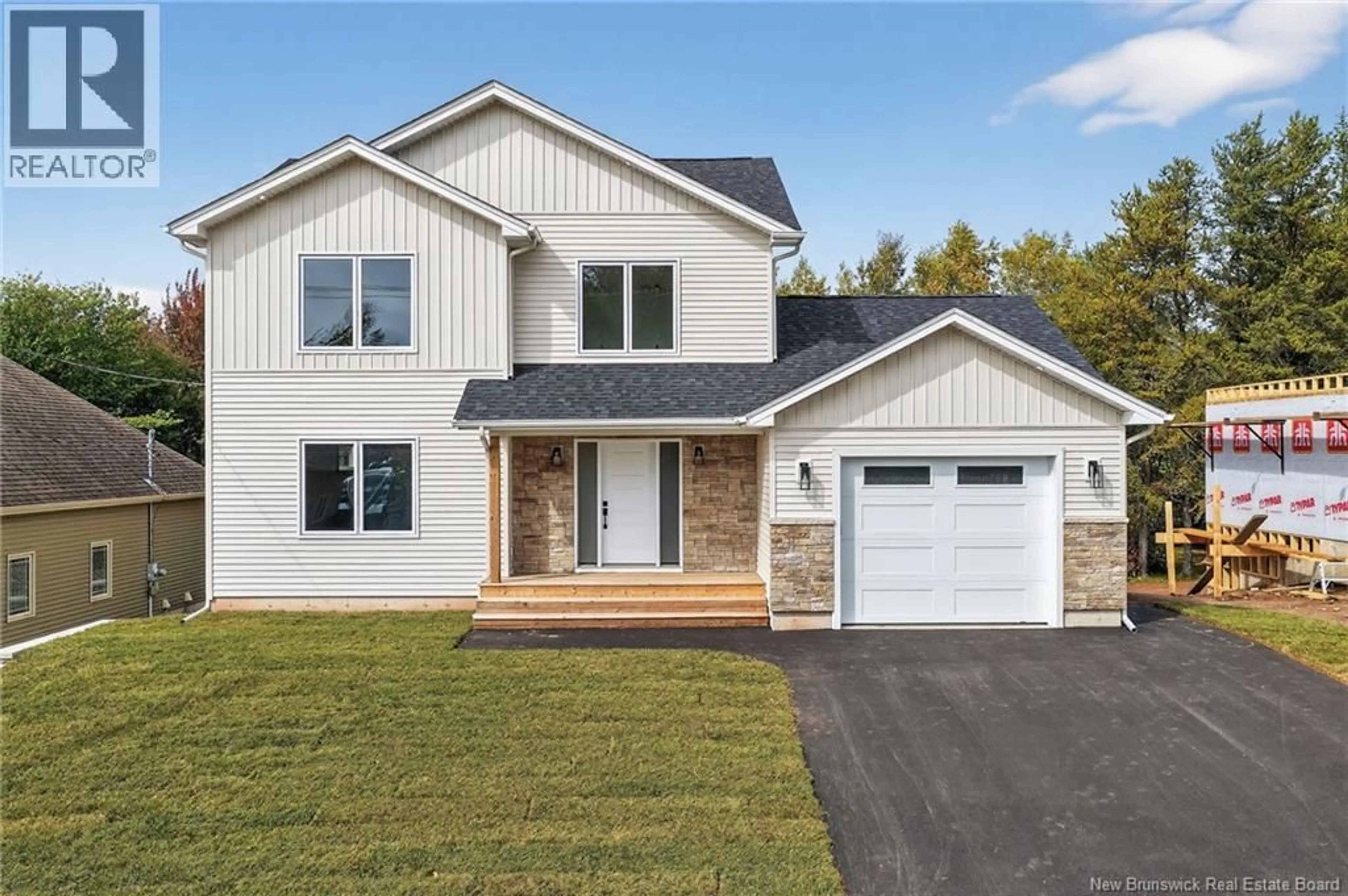 Home with vinyl exterior material, street for 206 BREAUX BRIDGE, Shediac New Brunswick E4P0Y3