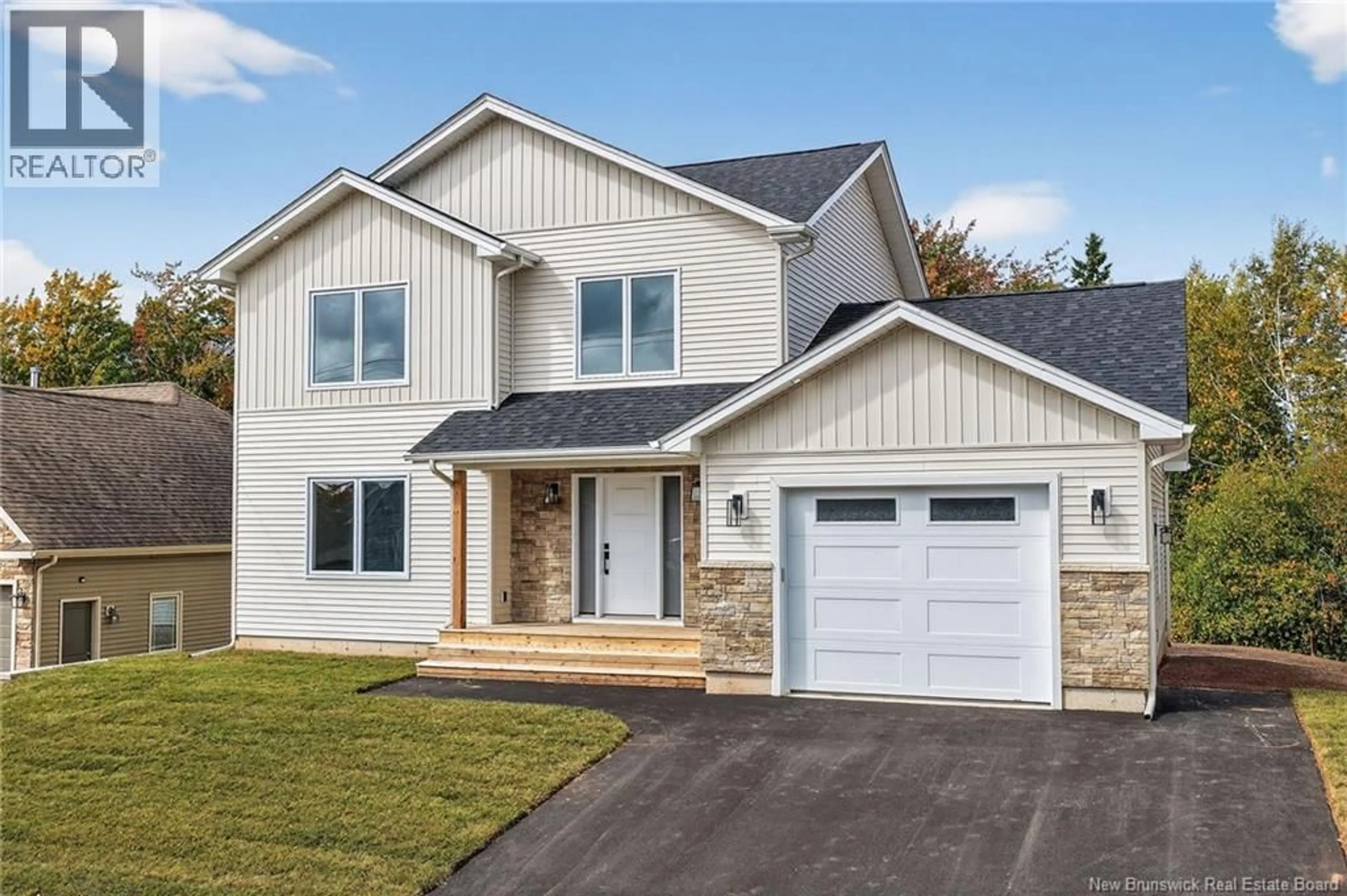Home with vinyl exterior material, street for 206 BREAUX BRIDGE, Shediac New Brunswick E4P0Y3