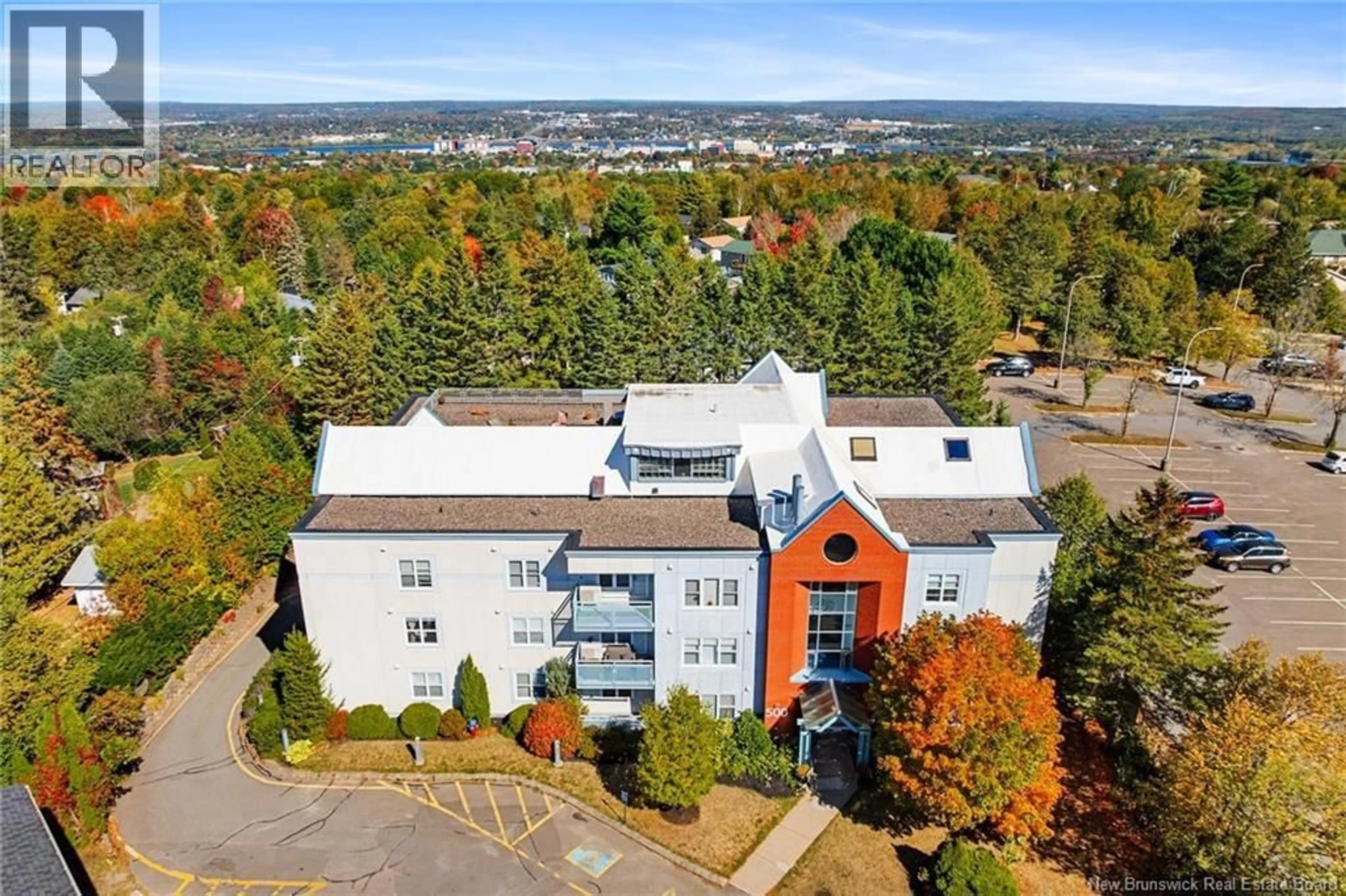 A pic from outside/outdoor area/front of a property/back of a property/a pic from drone, building for 320 - 500 VENUS COURT, Fredericton New Brunswick E3B3A9