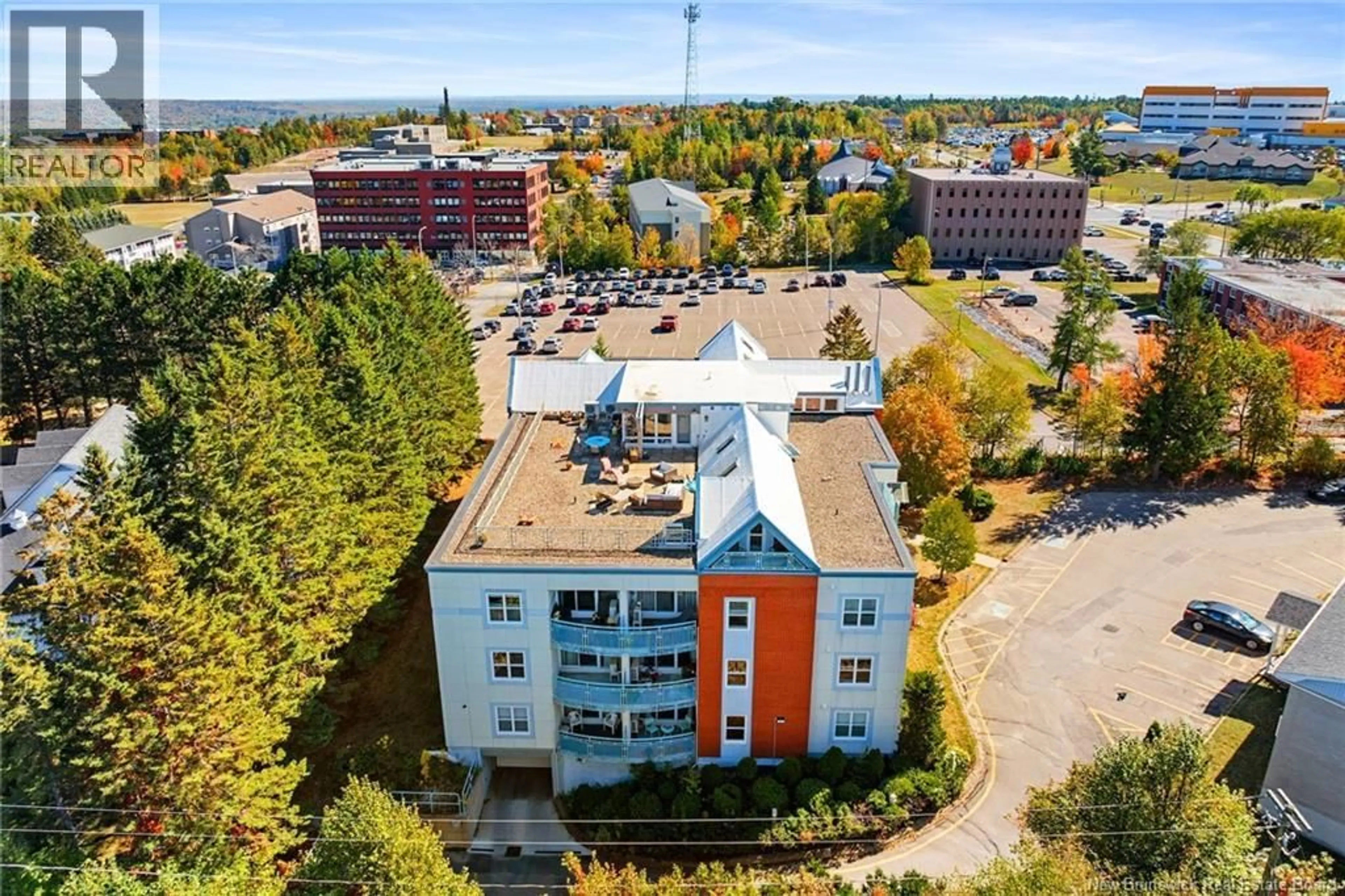 A pic from outside/outdoor area/front of a property/back of a property/a pic from drone, building for 320 - 500 VENUS COURT, Fredericton New Brunswick E3B3A9