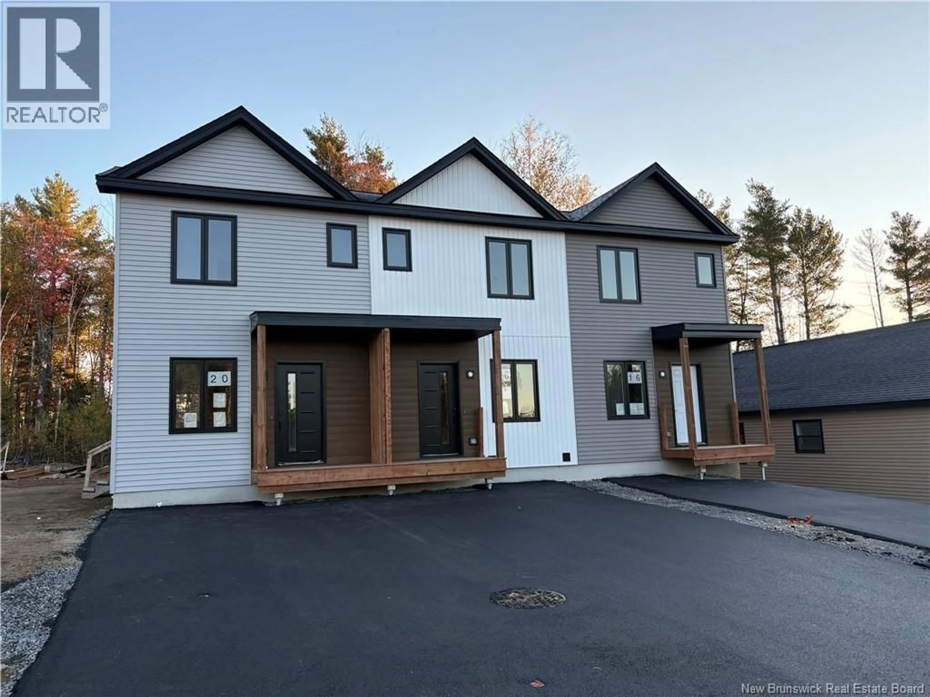 A pic from outside/outdoor area/front of a property/back of a property/a pic from drone, unknown for 18 TERRY FOX DRIVE, Oromocto New Brunswick E2V0P6