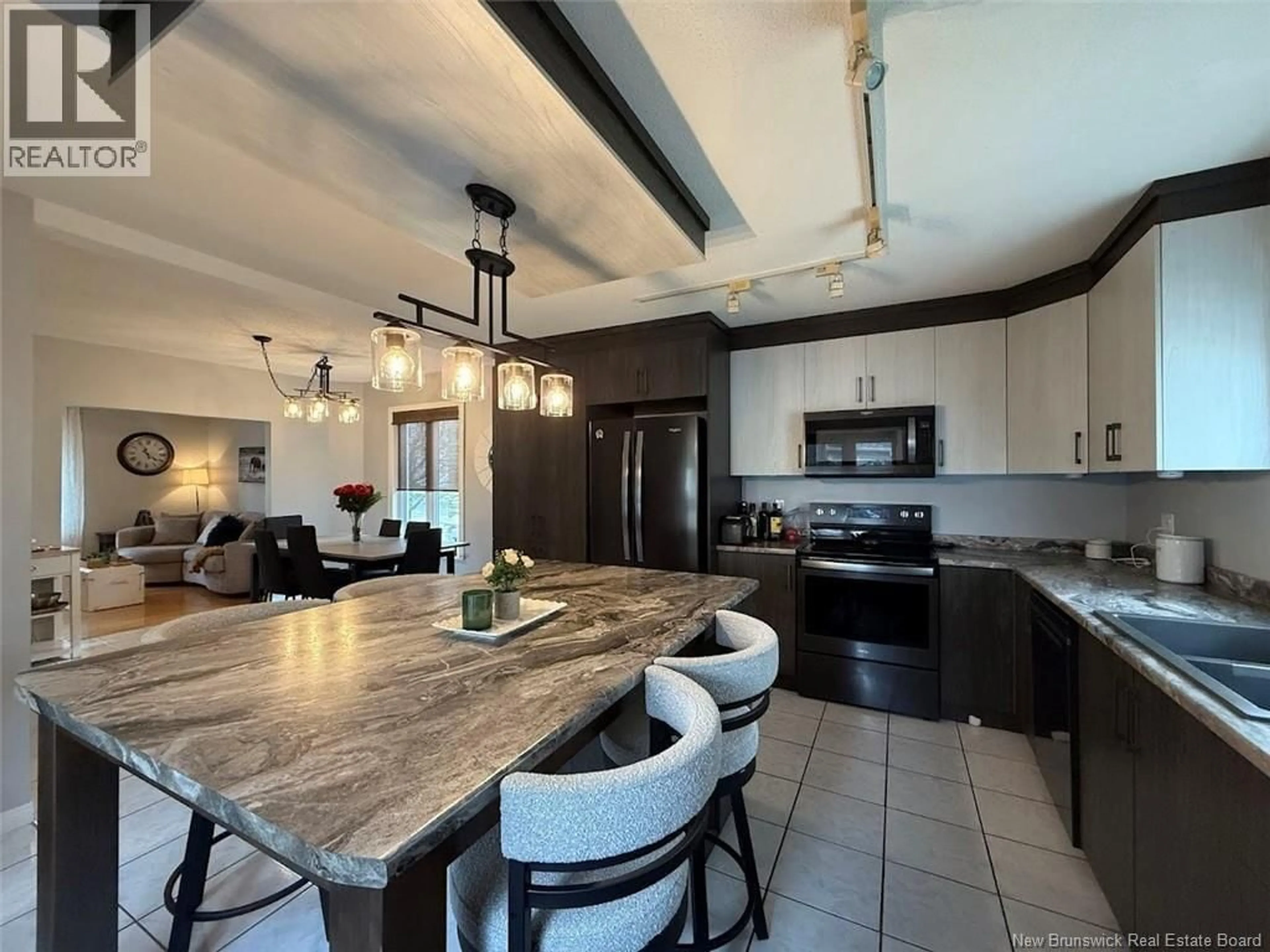 Open concept kitchen, ceramic/tile floor for 188 MARTIN STREET, Edmundston New Brunswick E3V2N5