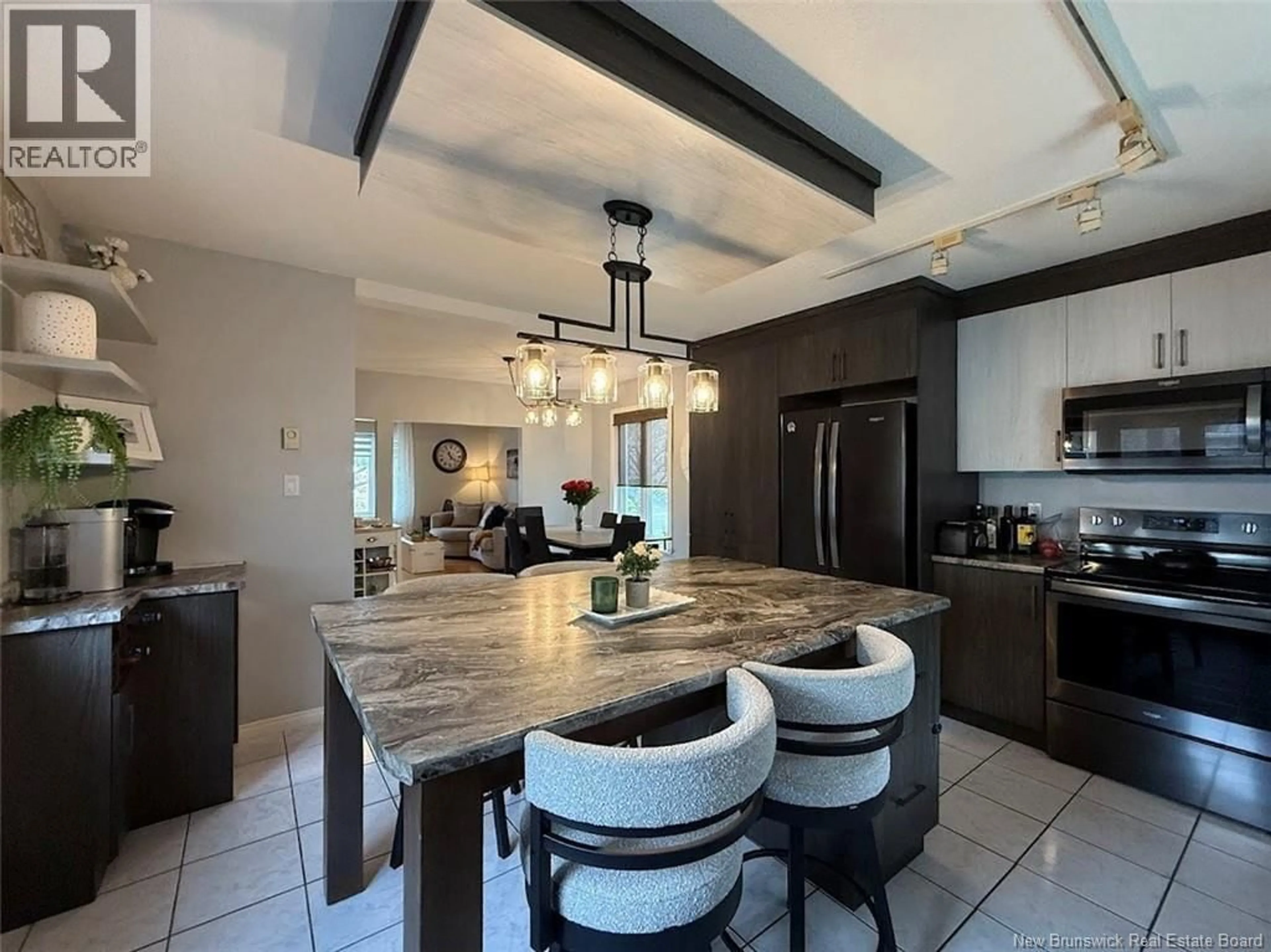 Open concept kitchen, ceramic/tile floor for 188 MARTIN STREET, Edmundston New Brunswick E3V2N5