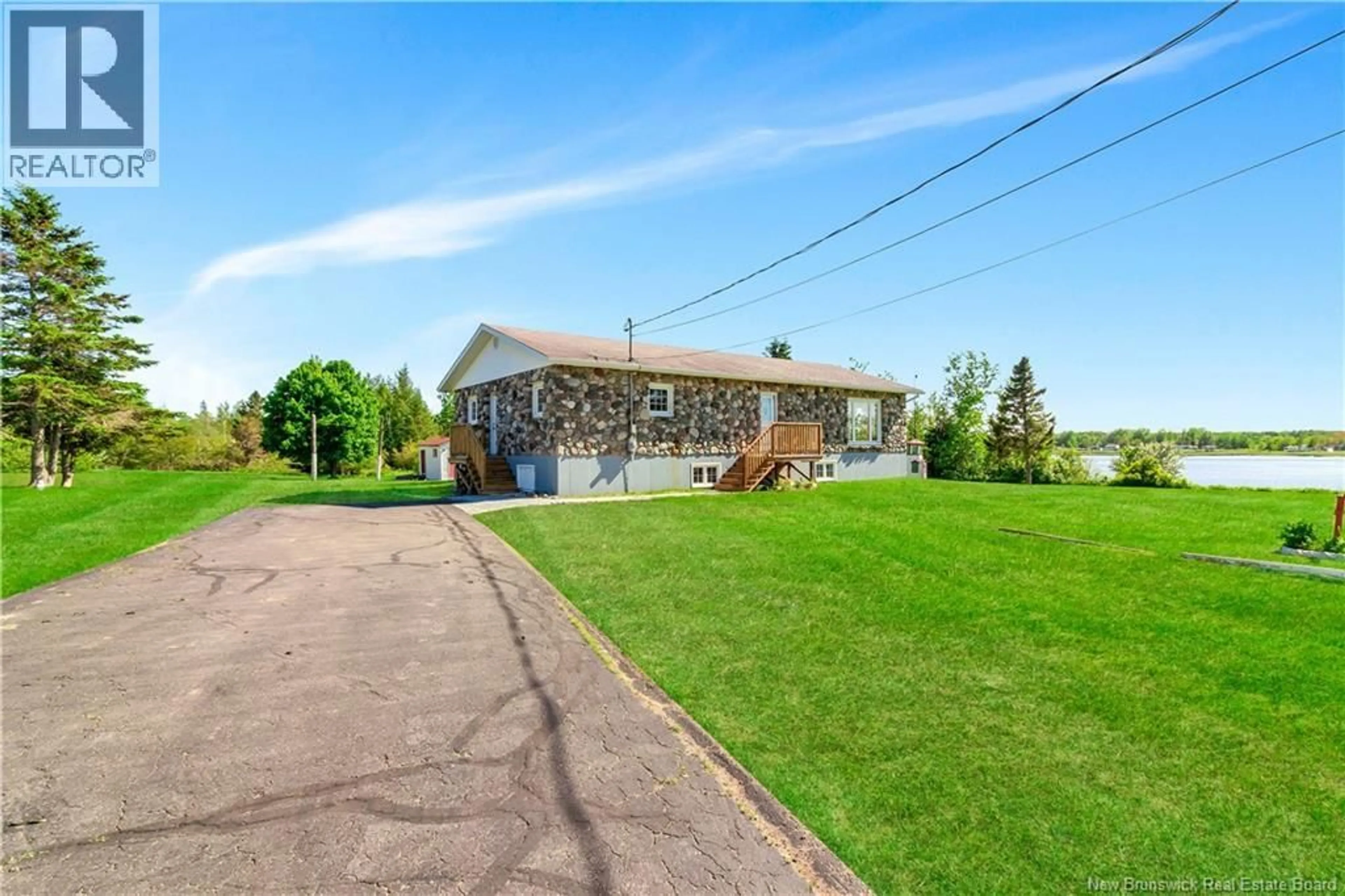 A pic from outside/outdoor area/front of a property/back of a property/a pic from drone, water/lake/river/ocean view for 1915 ROUTE 133, Grand-Barachois New Brunswick E4P8S7