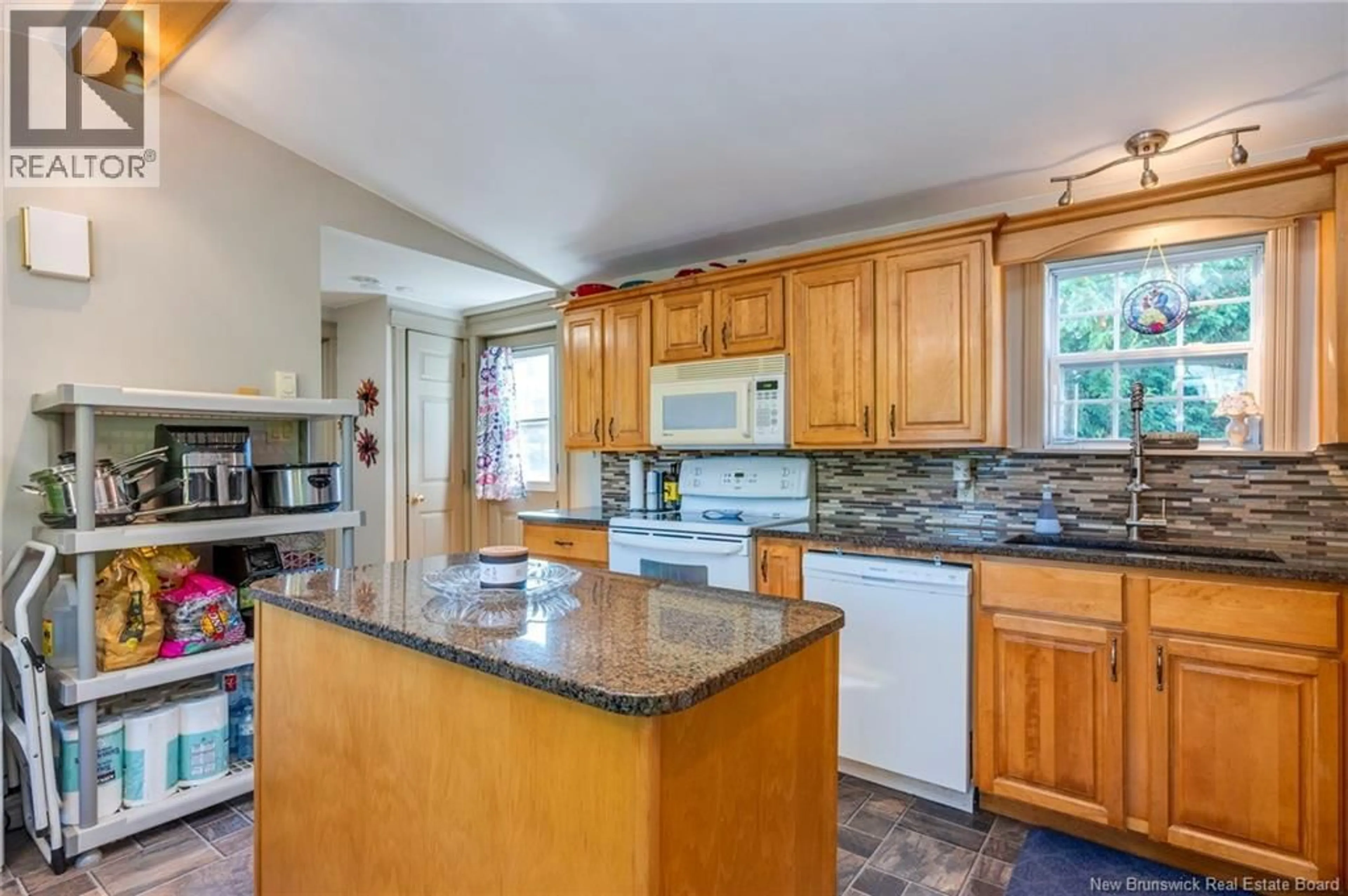 Open concept kitchen, ceramic/tile floor for 18 FIFTH STREET, Quispamsis New Brunswick E2G1W3