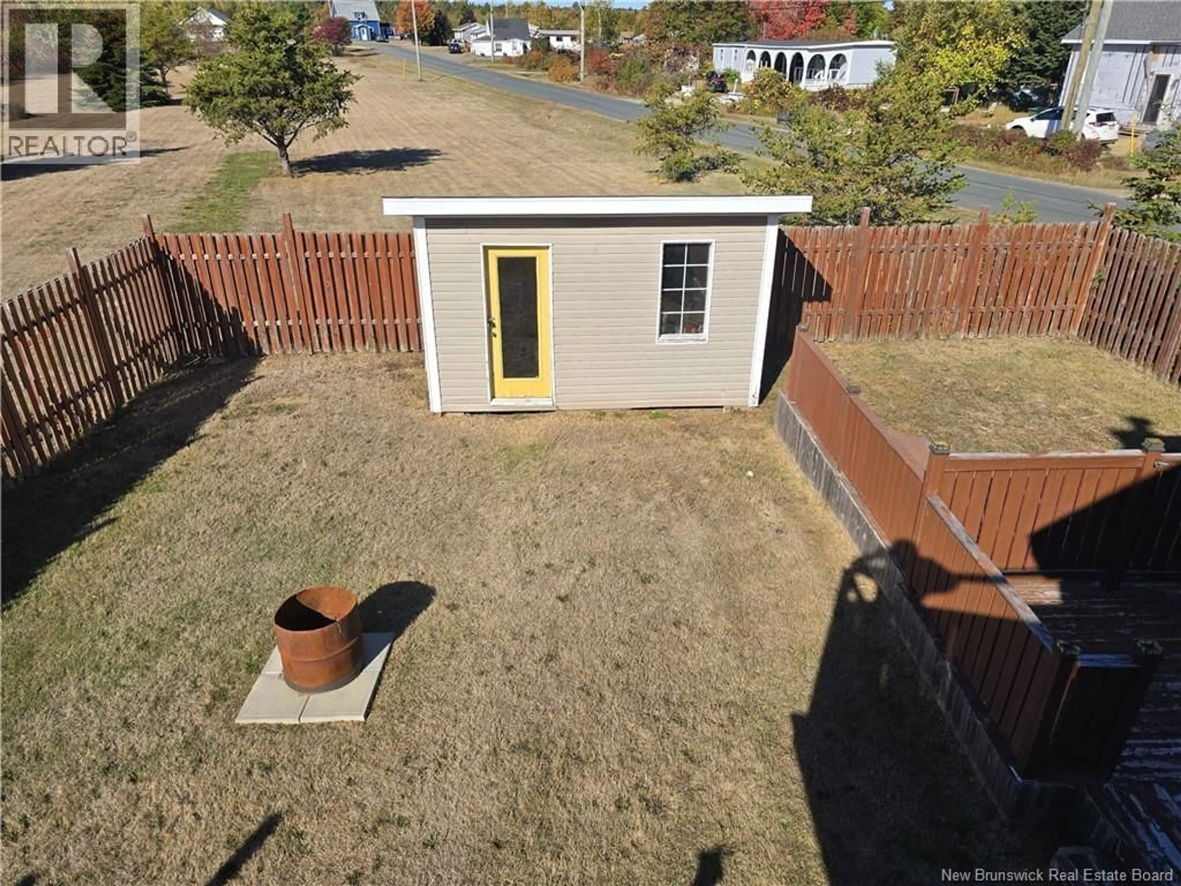A pic from outside/outdoor area/front of a property/back of a property/a pic from drone, street for 62 RUE SYLVAIN, Haut-Sheila New Brunswick E1X3R7