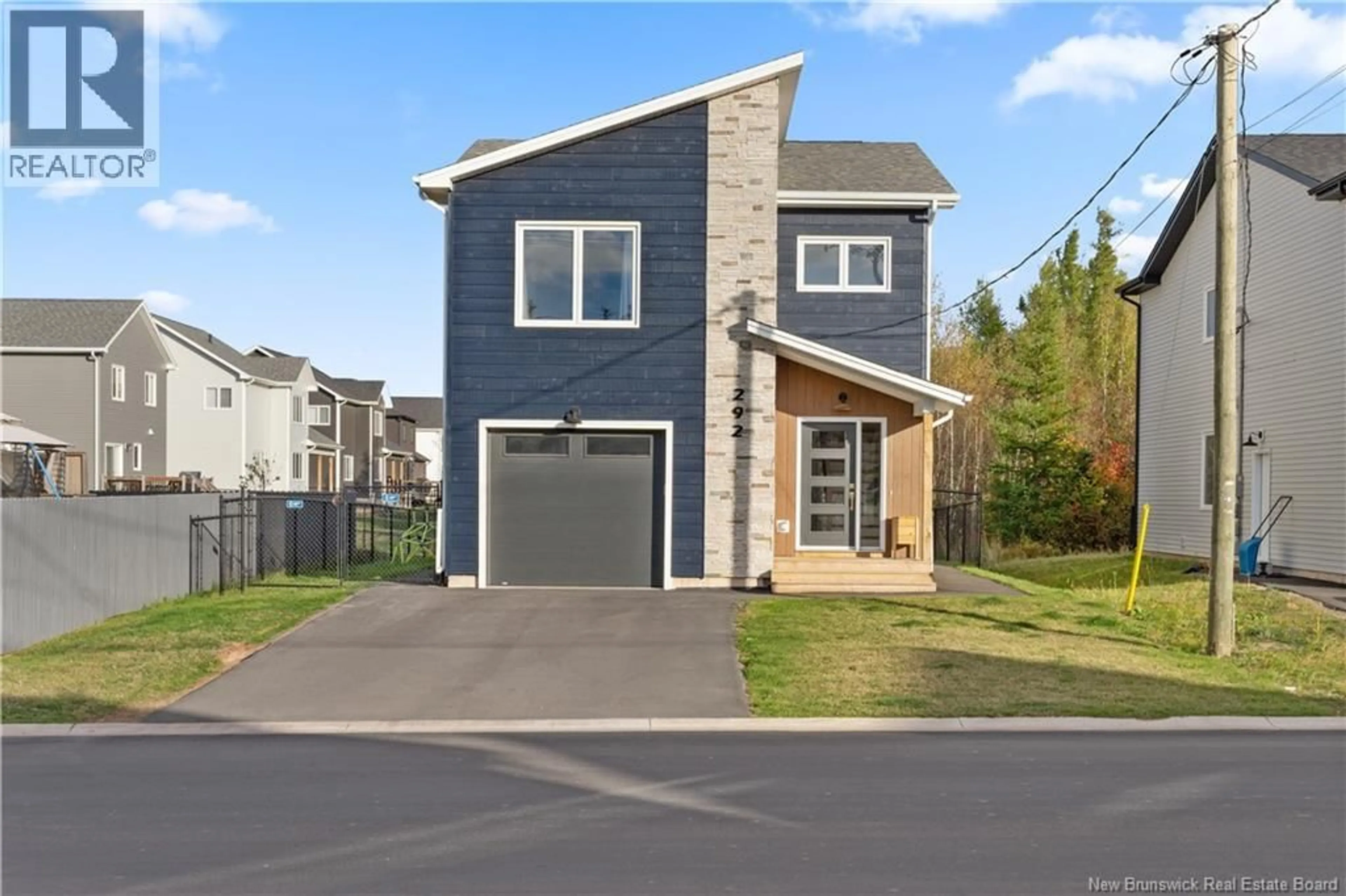 Home with vinyl exterior material, street for 292 FALCON DRIVE, Moncton New Brunswick E1G6J6