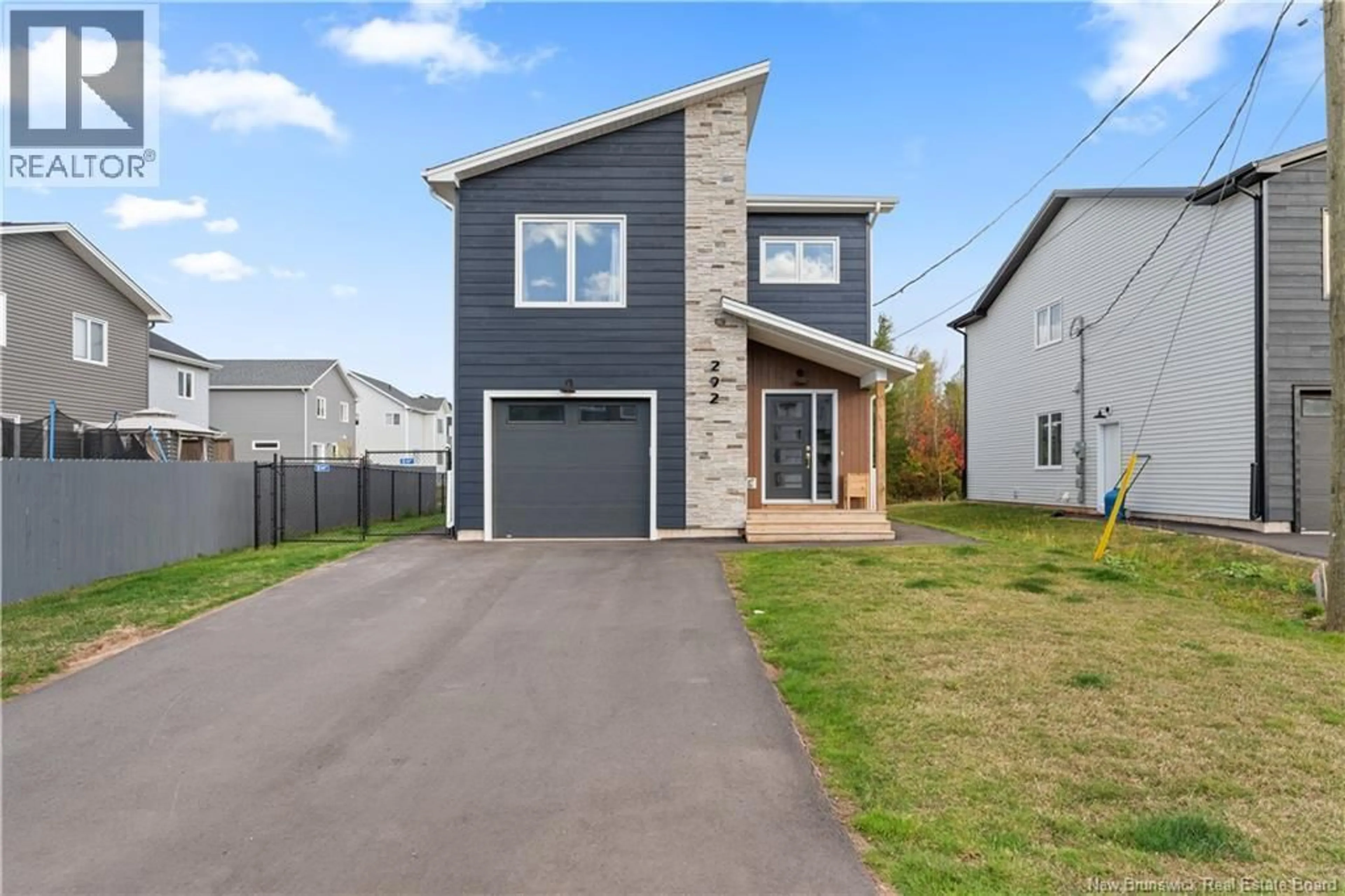 Home with vinyl exterior material, street for 292 FALCON DRIVE, Moncton New Brunswick E1G6J6