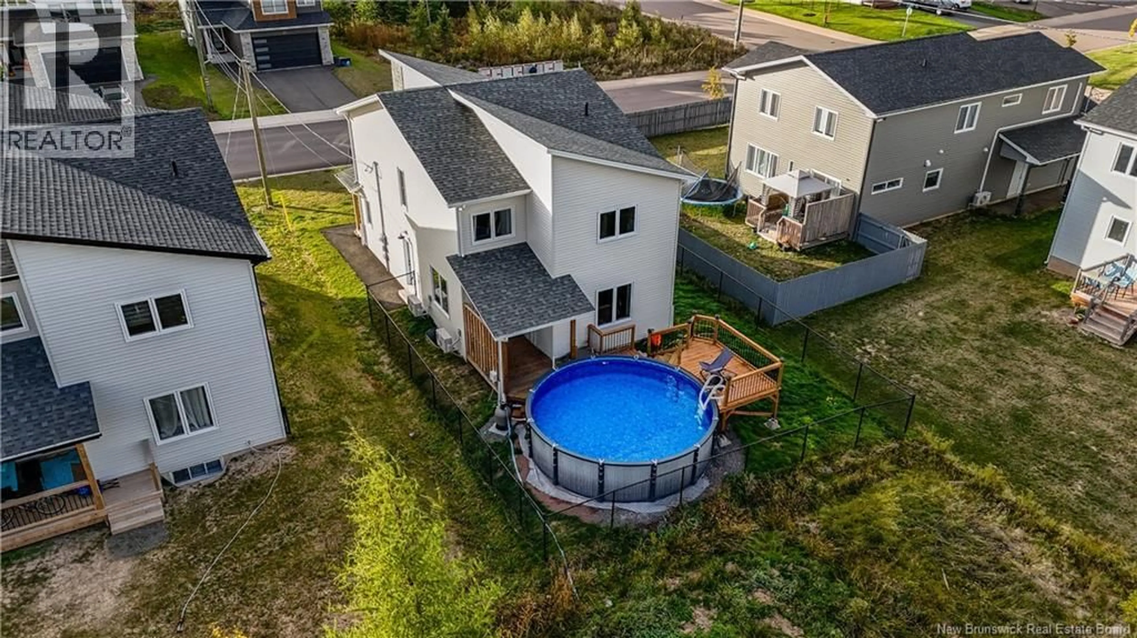 A pic from outside/outdoor area/front of a property/back of a property/a pic from drone, water/lake/river/ocean view for 292 FALCON DRIVE, Moncton New Brunswick E1G6J6