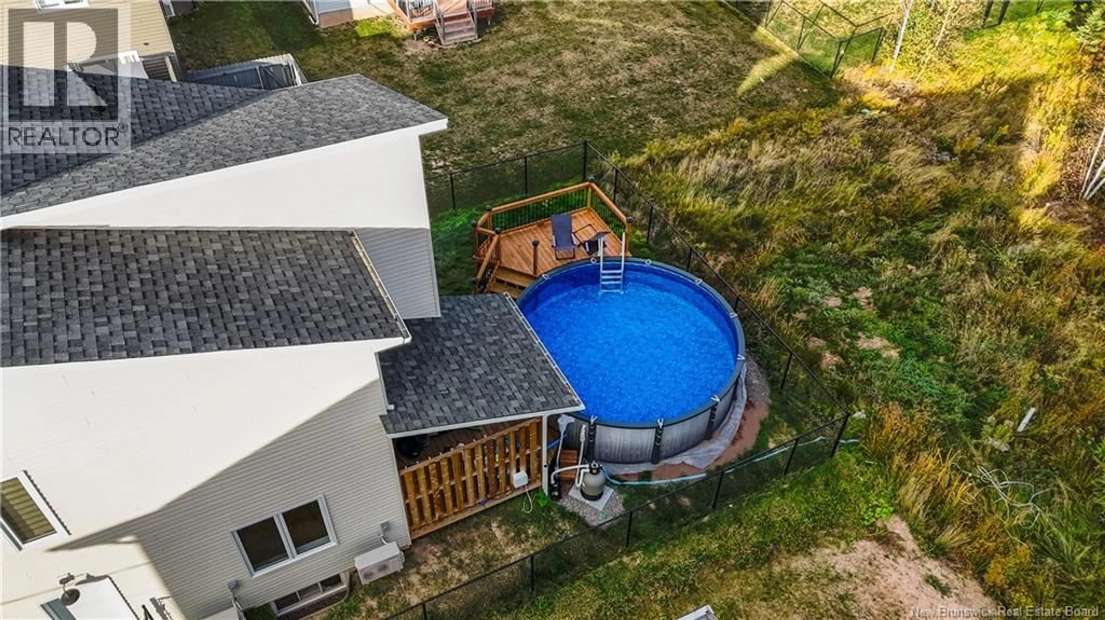 A pic from outside/outdoor area/front of a property/back of a property/a pic from drone, water/lake/river/ocean view for 292 FALCON DRIVE, Moncton New Brunswick E1G6J6