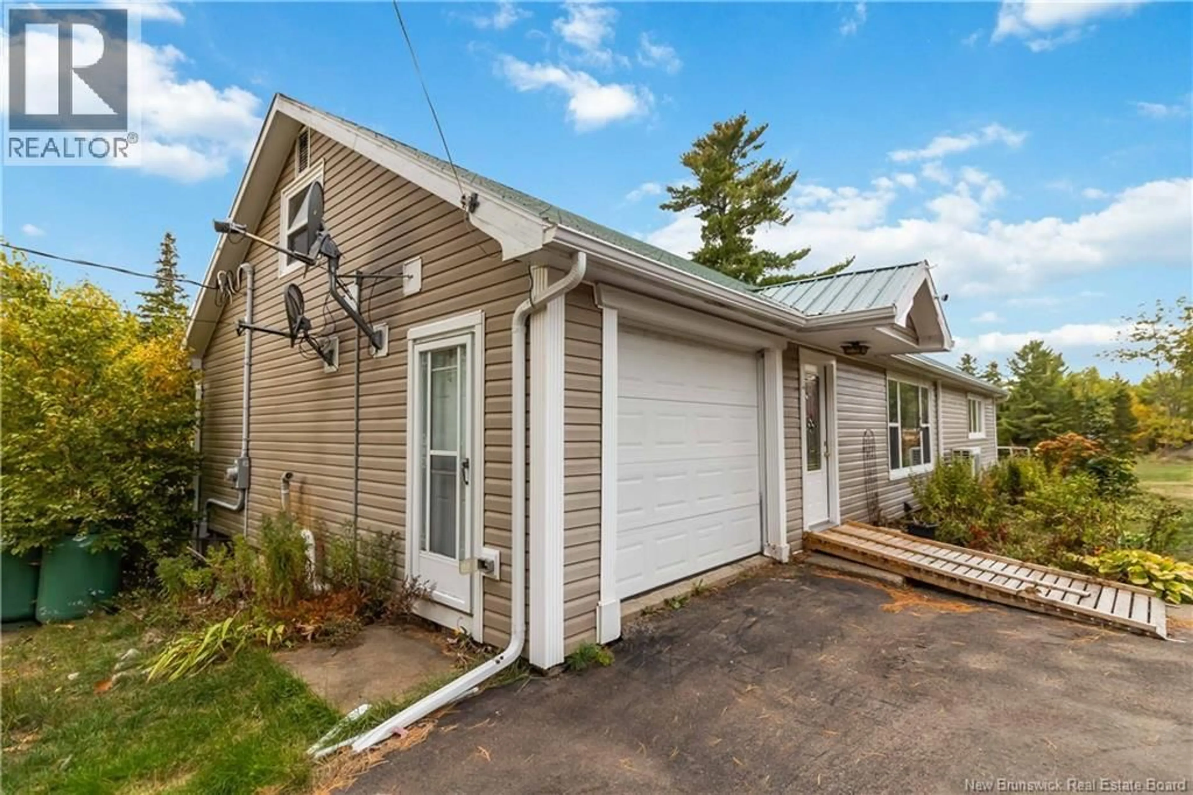 Home with vinyl exterior material, street for 3182 PARKINDALE ROAD, Elgin New Brunswick E4Z2S1