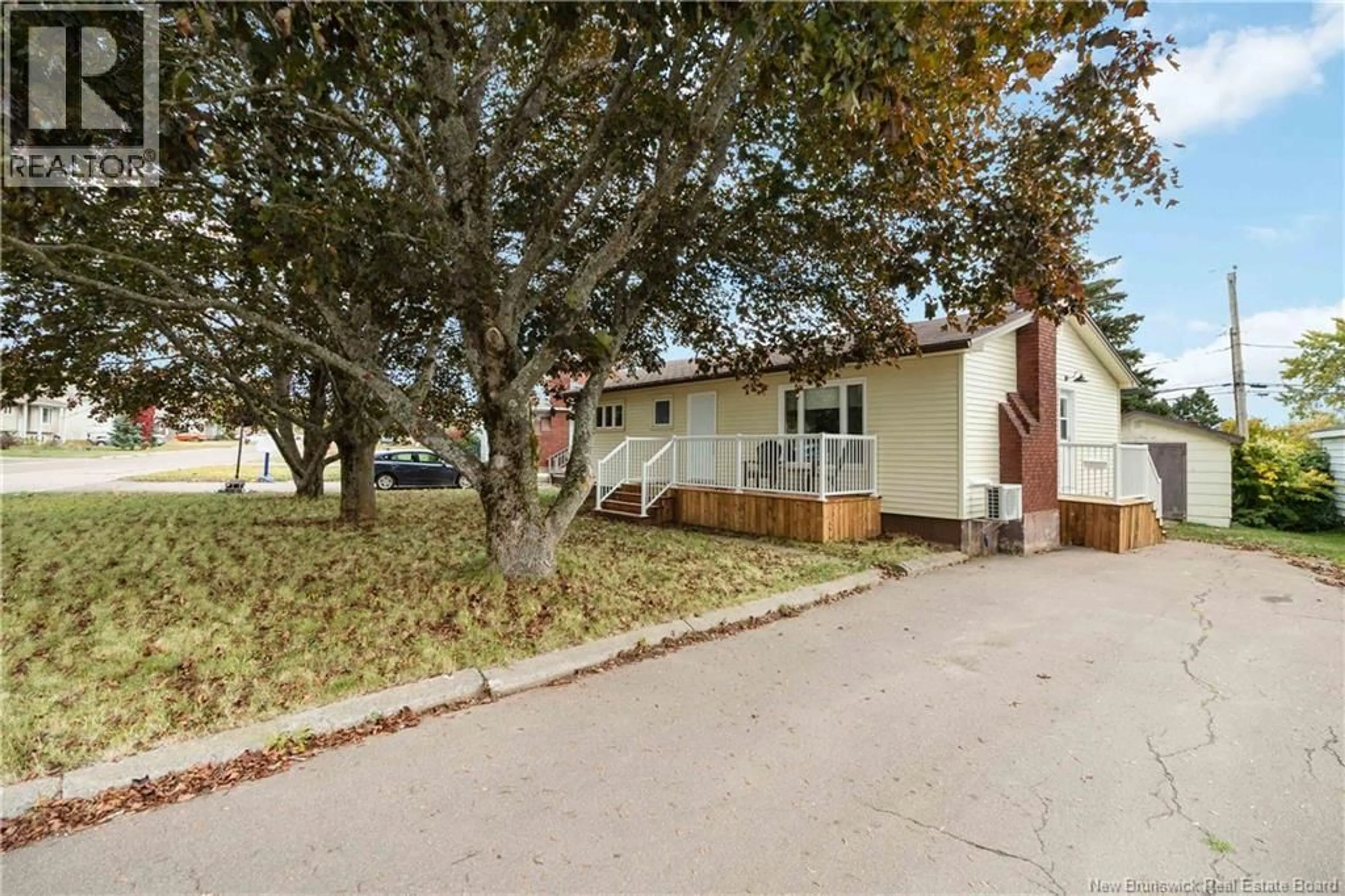 Home with vinyl exterior material, street for 22 WYNWOOD DRIVE, Moncton New Brunswick E1A2M3