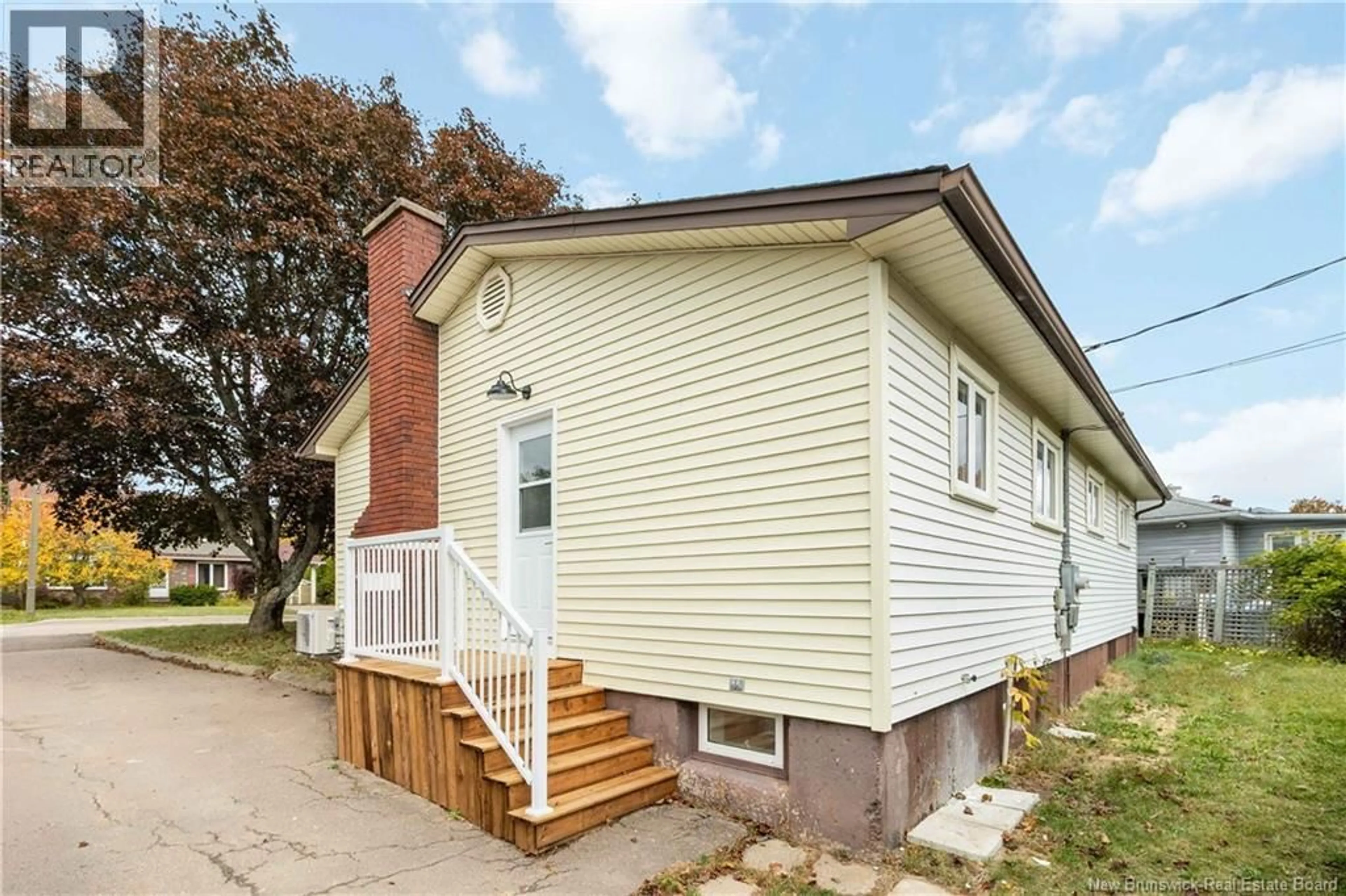 Home with vinyl exterior material, street for 22 WYNWOOD DRIVE, Moncton New Brunswick E1A2M3