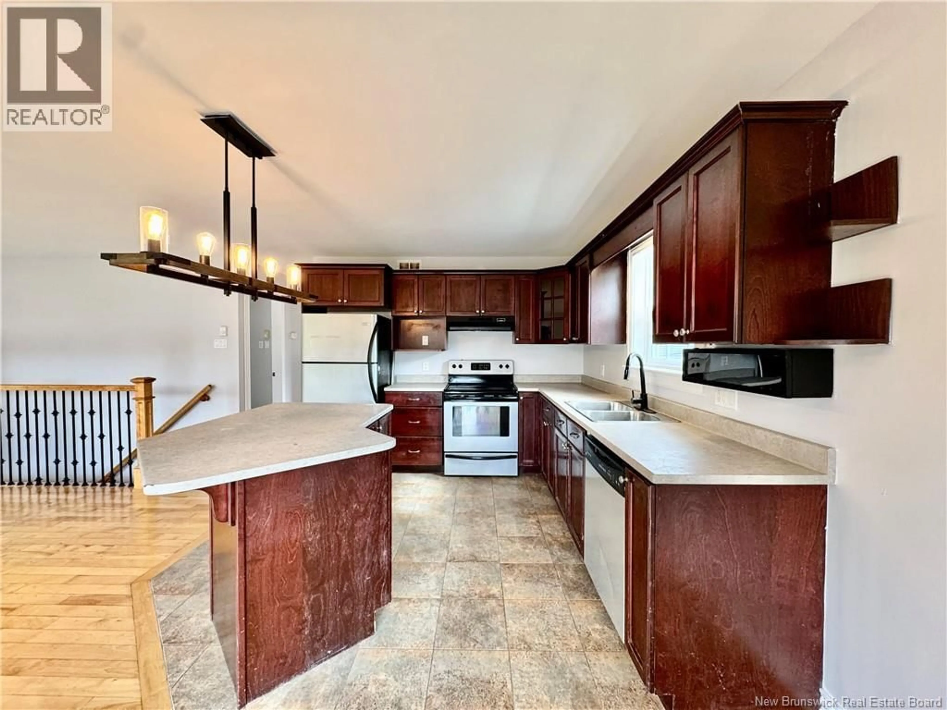 Open concept kitchen, ceramic/tile floor for 193 HOULAHAN, Dieppe New Brunswick E1A4X6