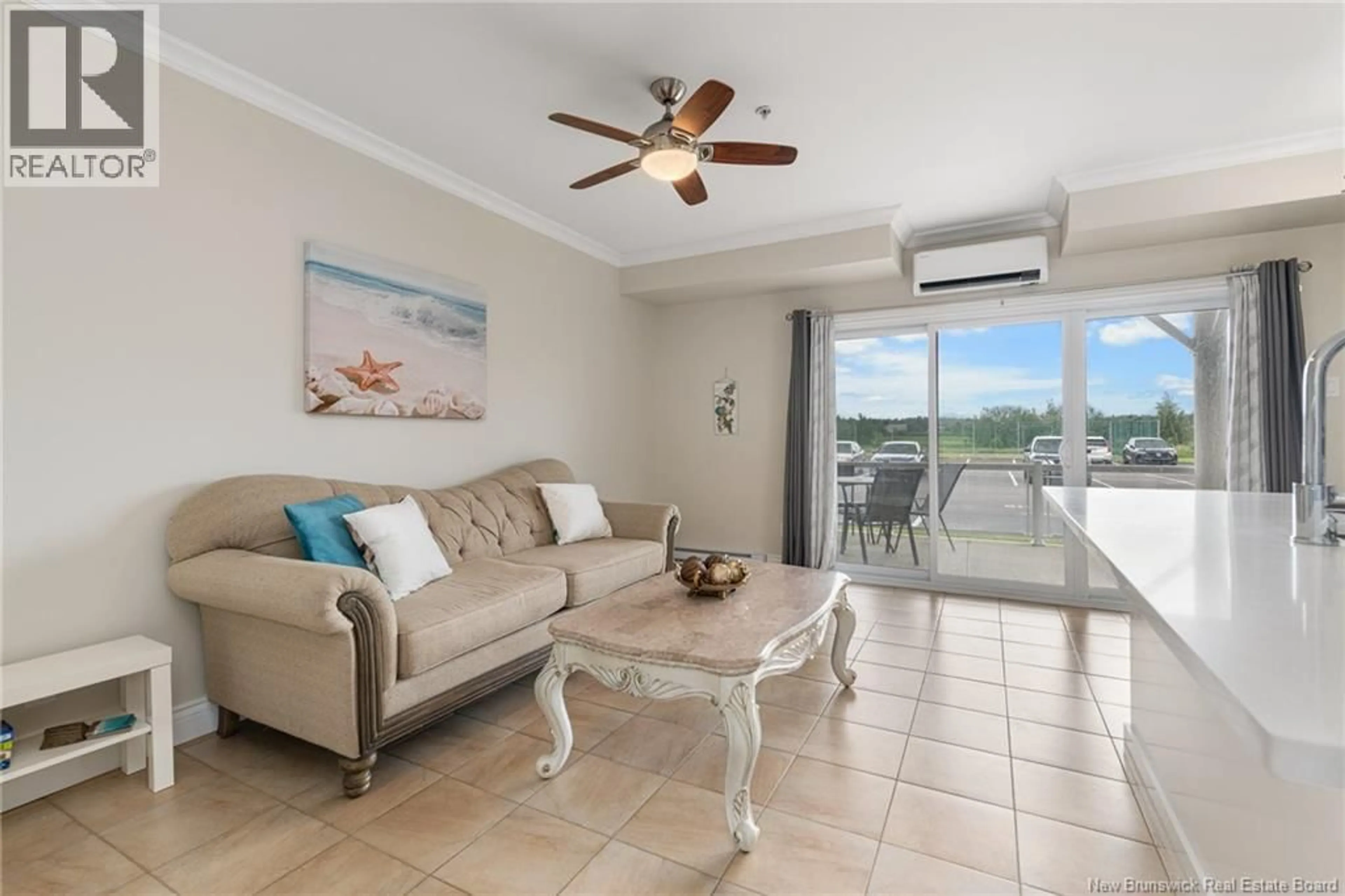 Living room with furniture, ceramic/tile floor for 119 - 69 CAP BIMET BOULEVARD, Grand-Barachois New Brunswick E4P6X5