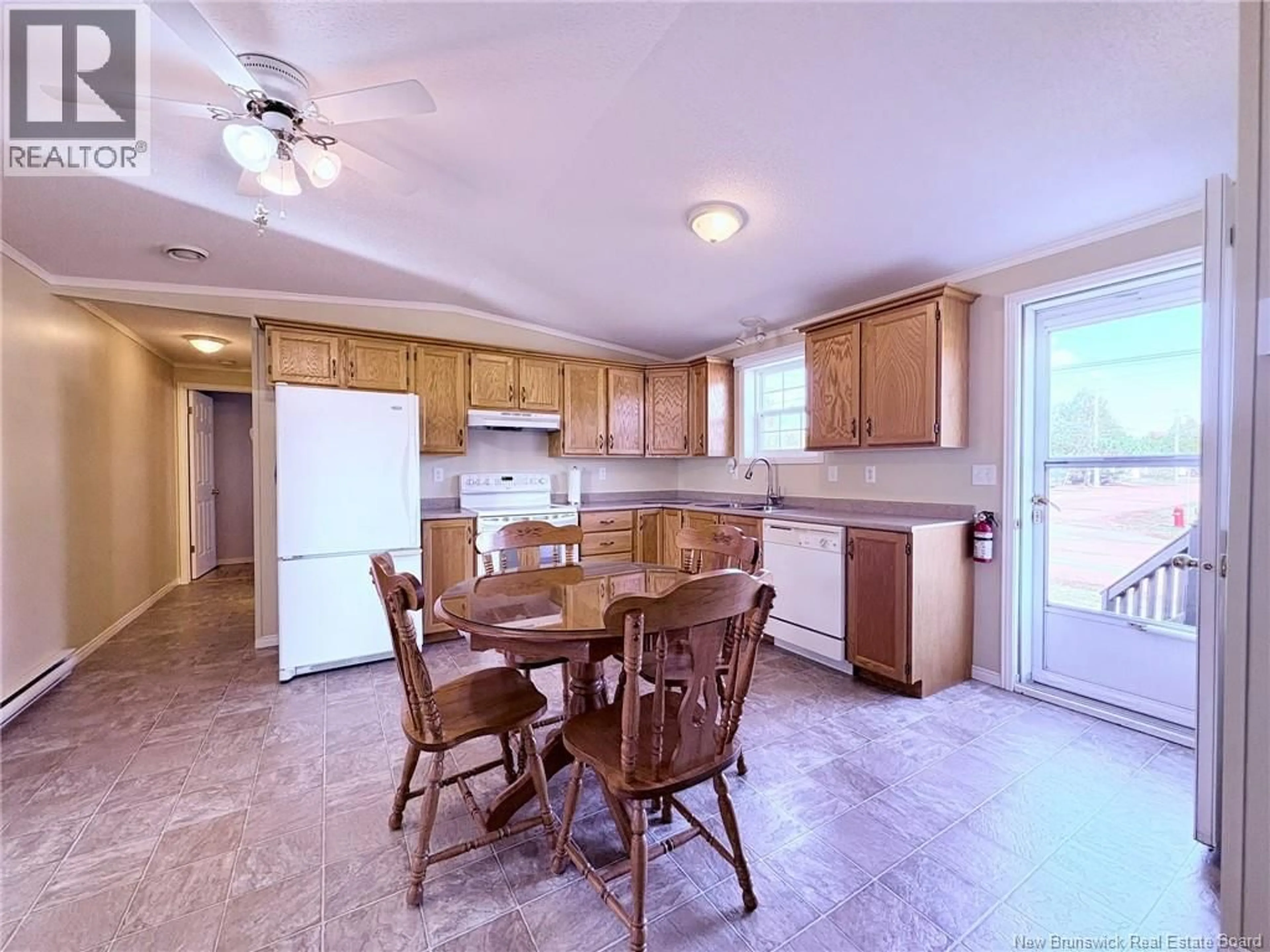 Open concept kitchen, ceramic/tile floor for 27 SOPHIE DRIVE, Dieppe New Brunswick E1A7X5