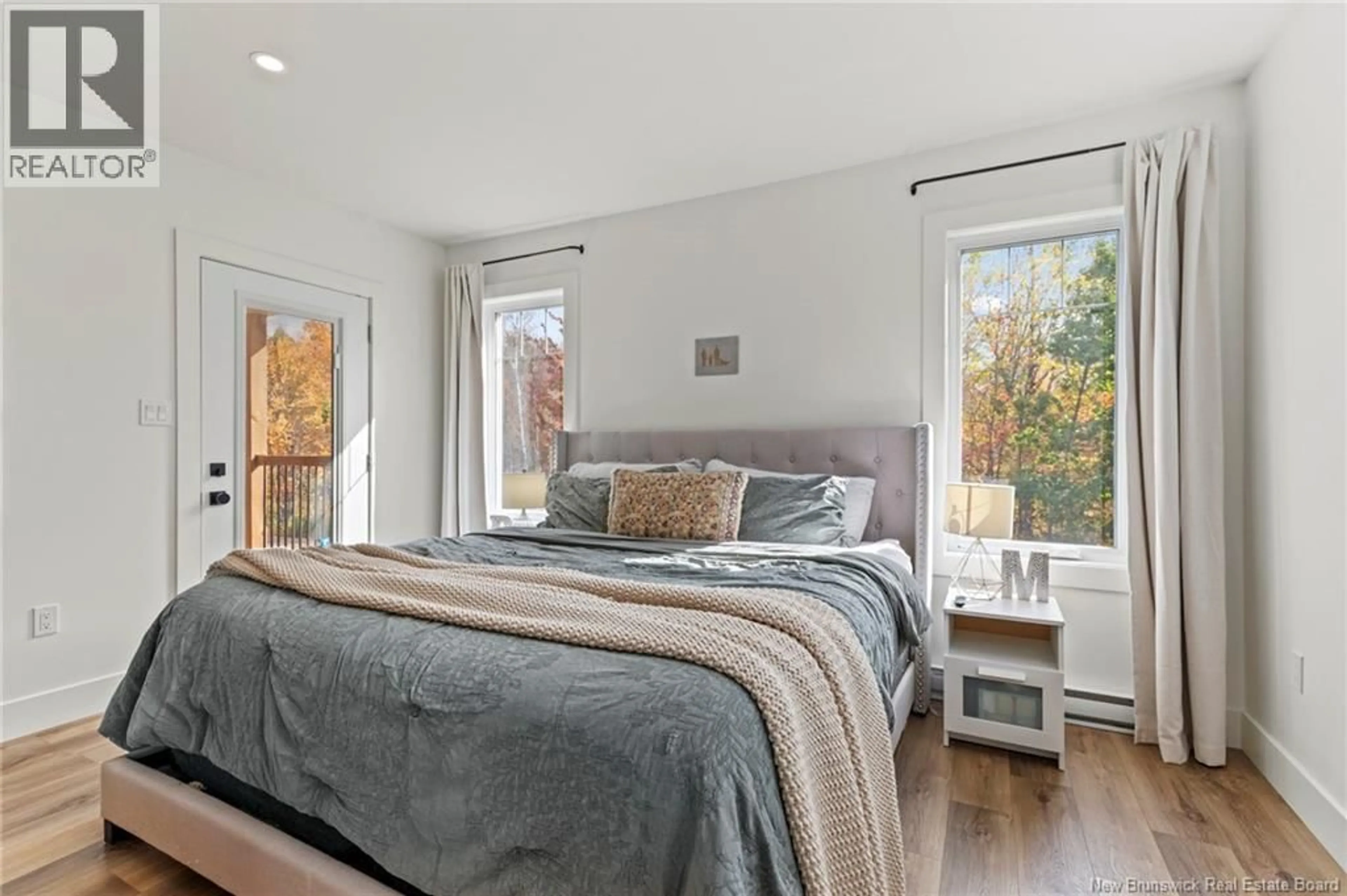 Bedroom with bed, wood/laminate floor for 27 HEMLOCK STREET, Penniac New Brunswick E3A4X5