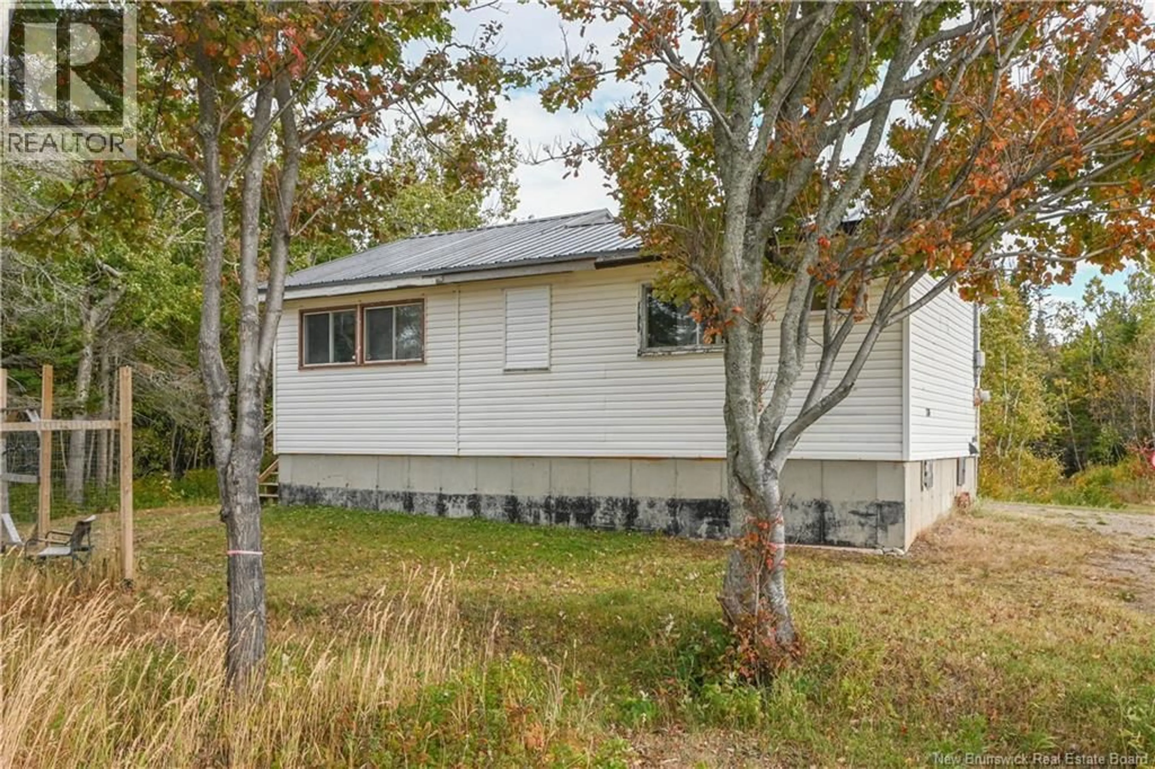 Home with vinyl exterior material, street for 1394 DEGRÂCE STREET, Maisonnette New Brunswick E8N2J4
