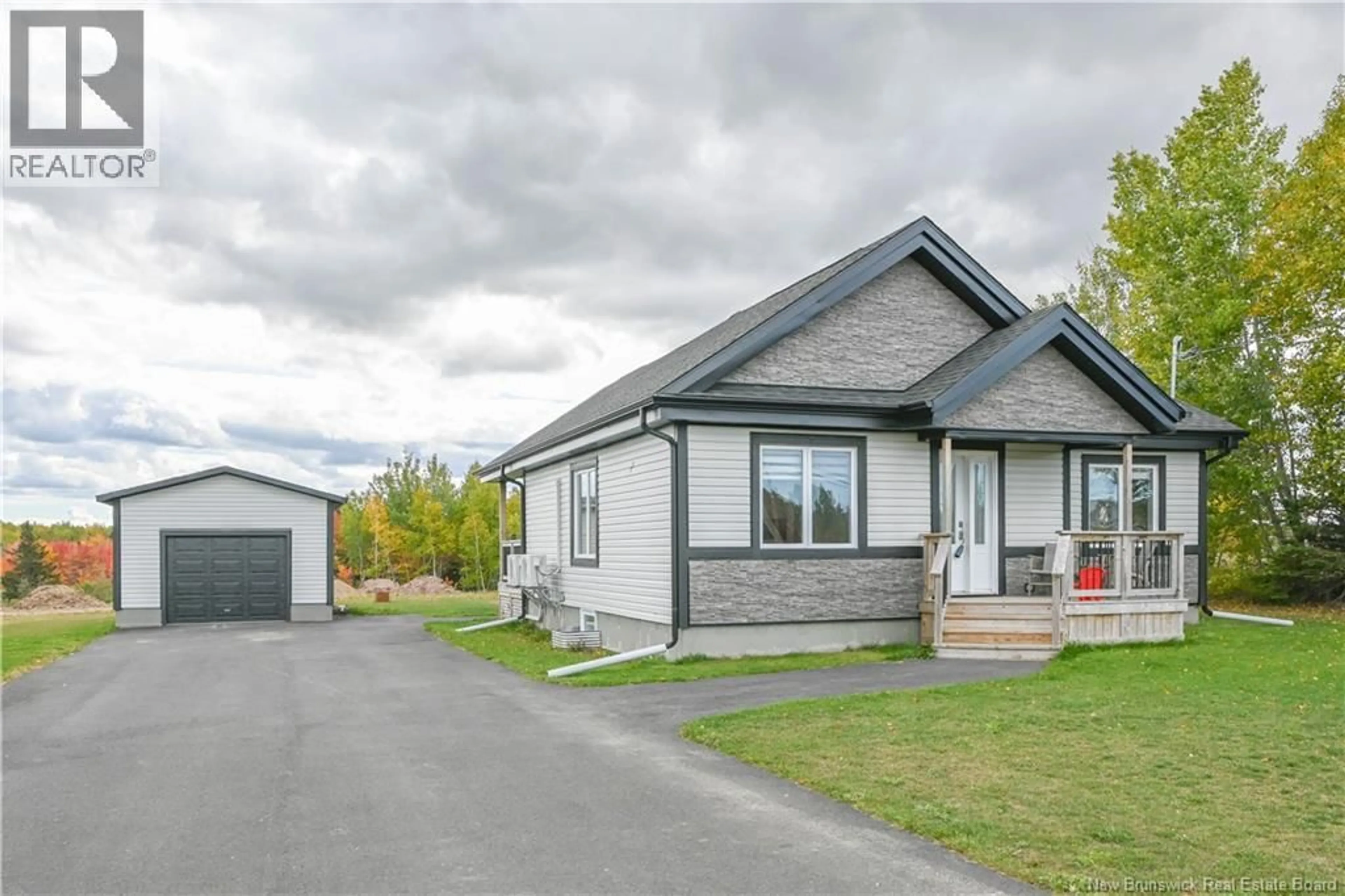 Home with vinyl exterior material, street for 5892 340 ROUTE ROUTE, Haut-Paquetville New Brunswick E8R1S8