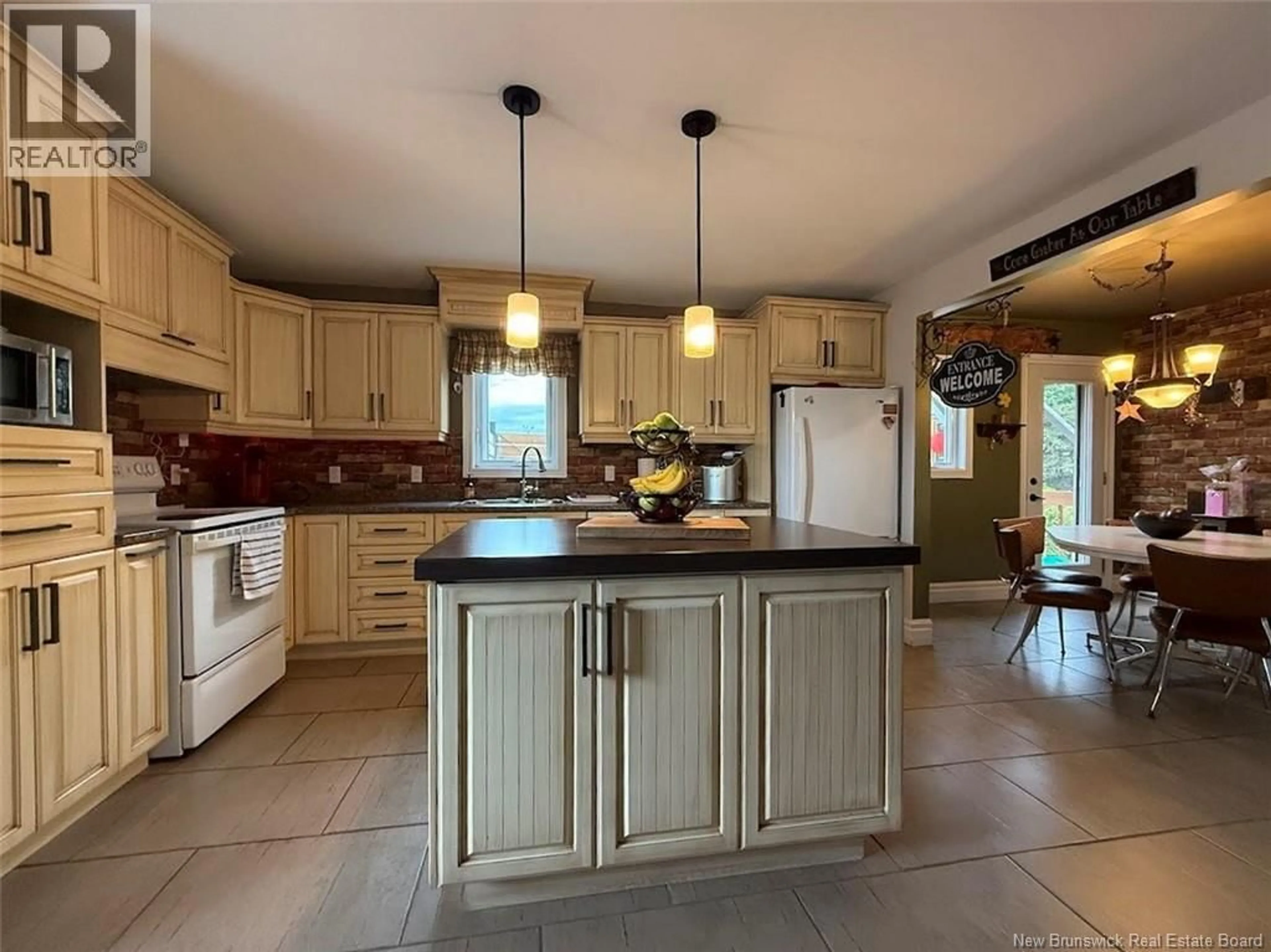 Open concept kitchen, ceramic/tile floor for 84 39TH AVENUE, Edmundston New Brunswick E3V2X2