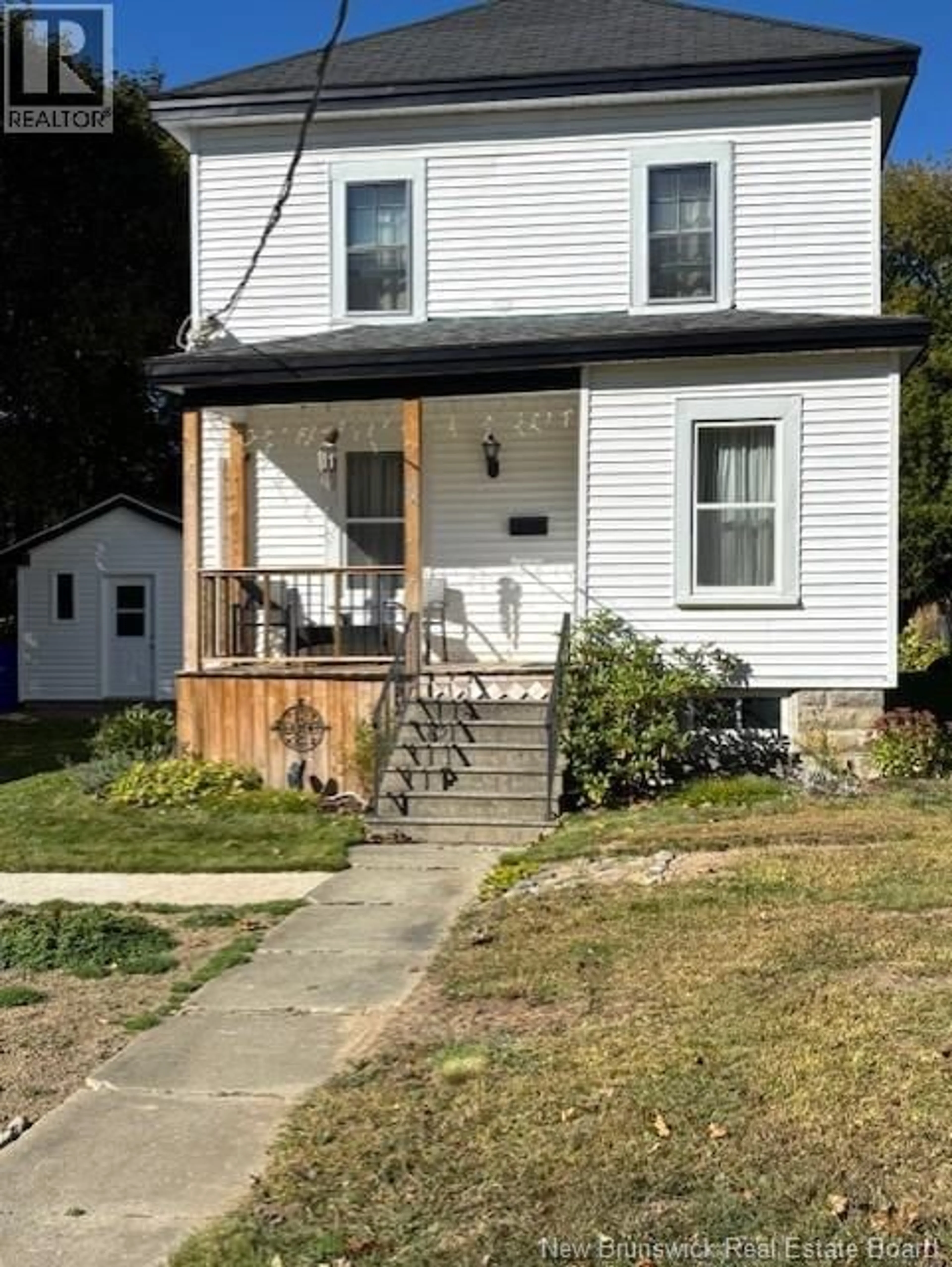 Home with vinyl exterior material, street for 46 ELM, St. Stephen New Brunswick E3L2S6