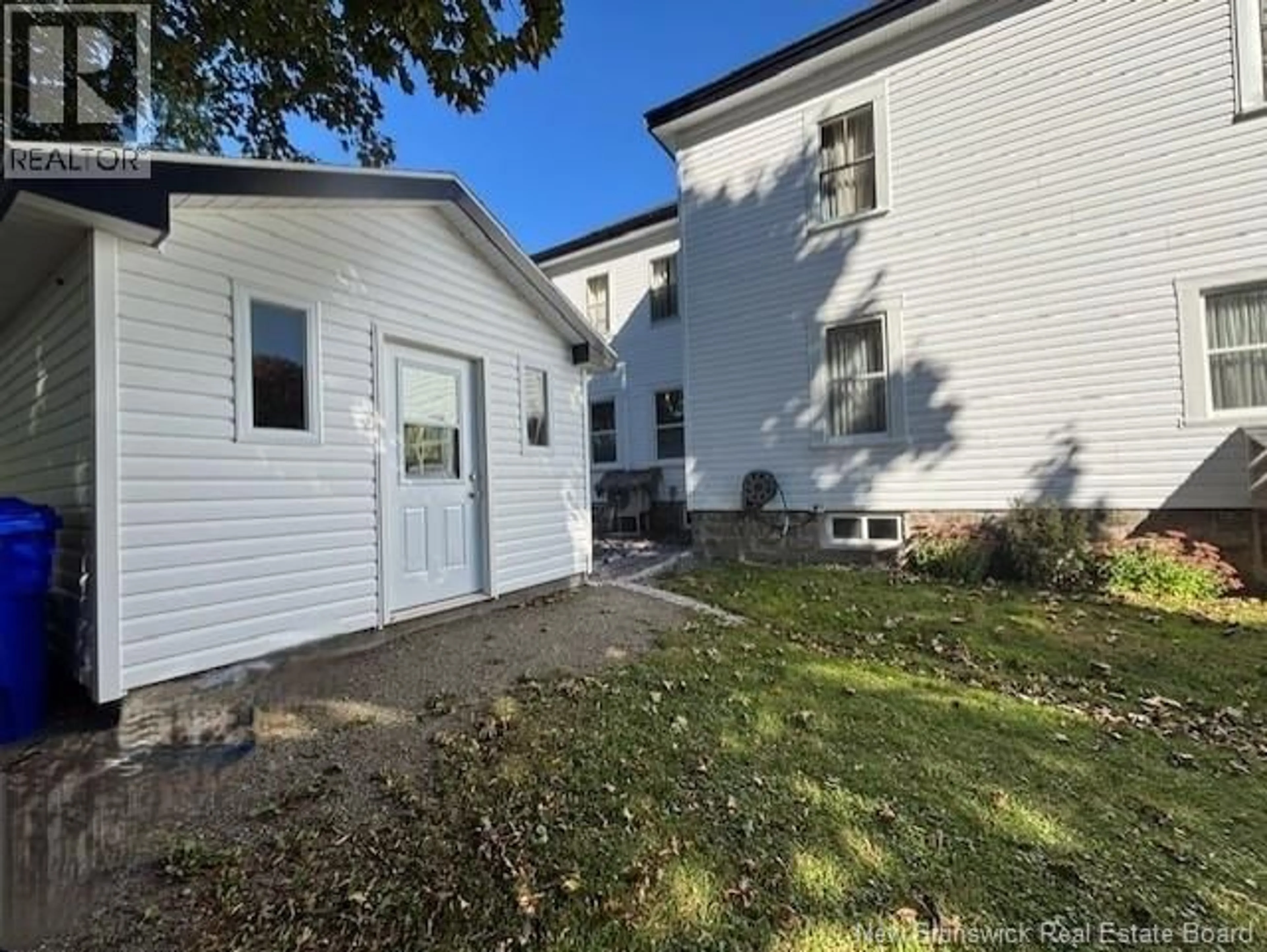 A pic from outside/outdoor area/front of a property/back of a property/a pic from drone, street for 46 ELM, St. Stephen New Brunswick E3L2S6
