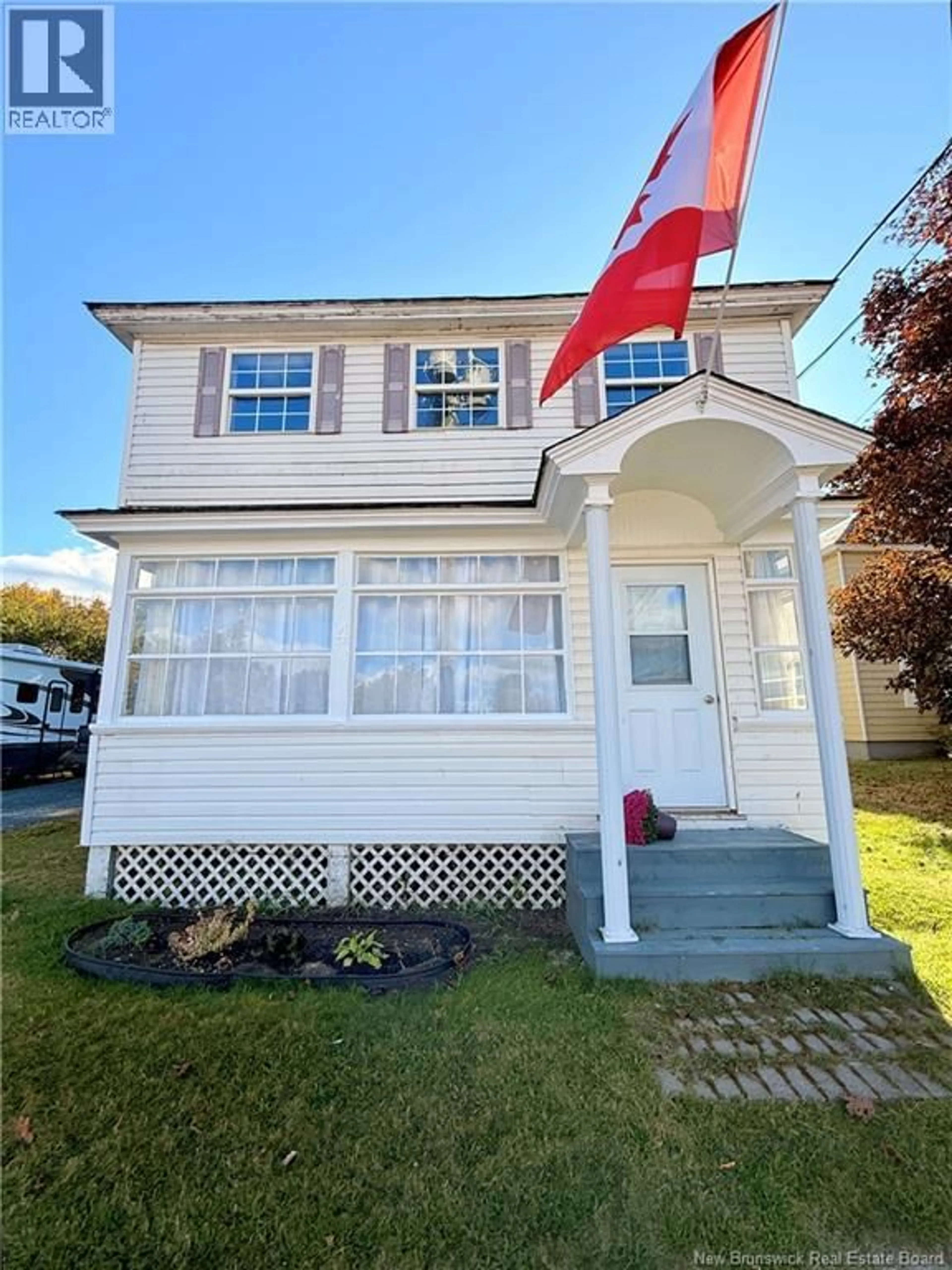 Home with vinyl exterior material, street for 4 STATION STREET, Blackville New Brunswick E9B1R2