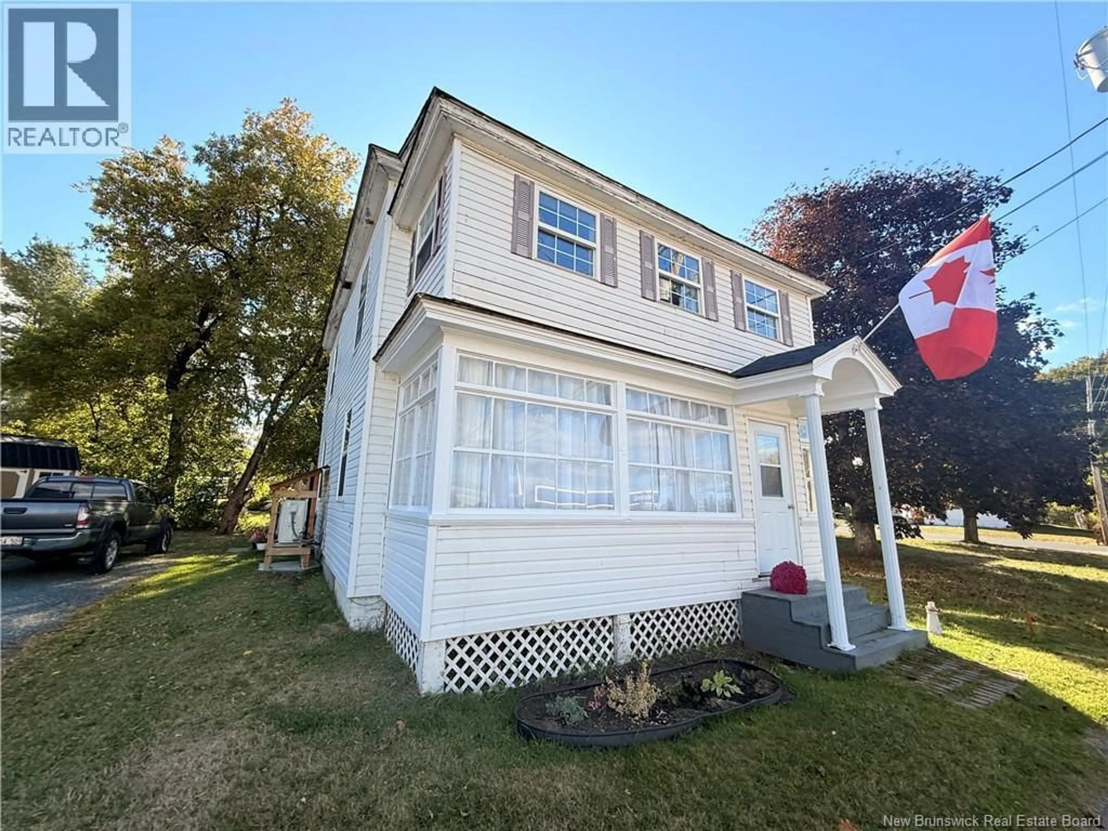 Home with vinyl exterior material, street for 4 STATION STREET, Blackville New Brunswick E9B1R2