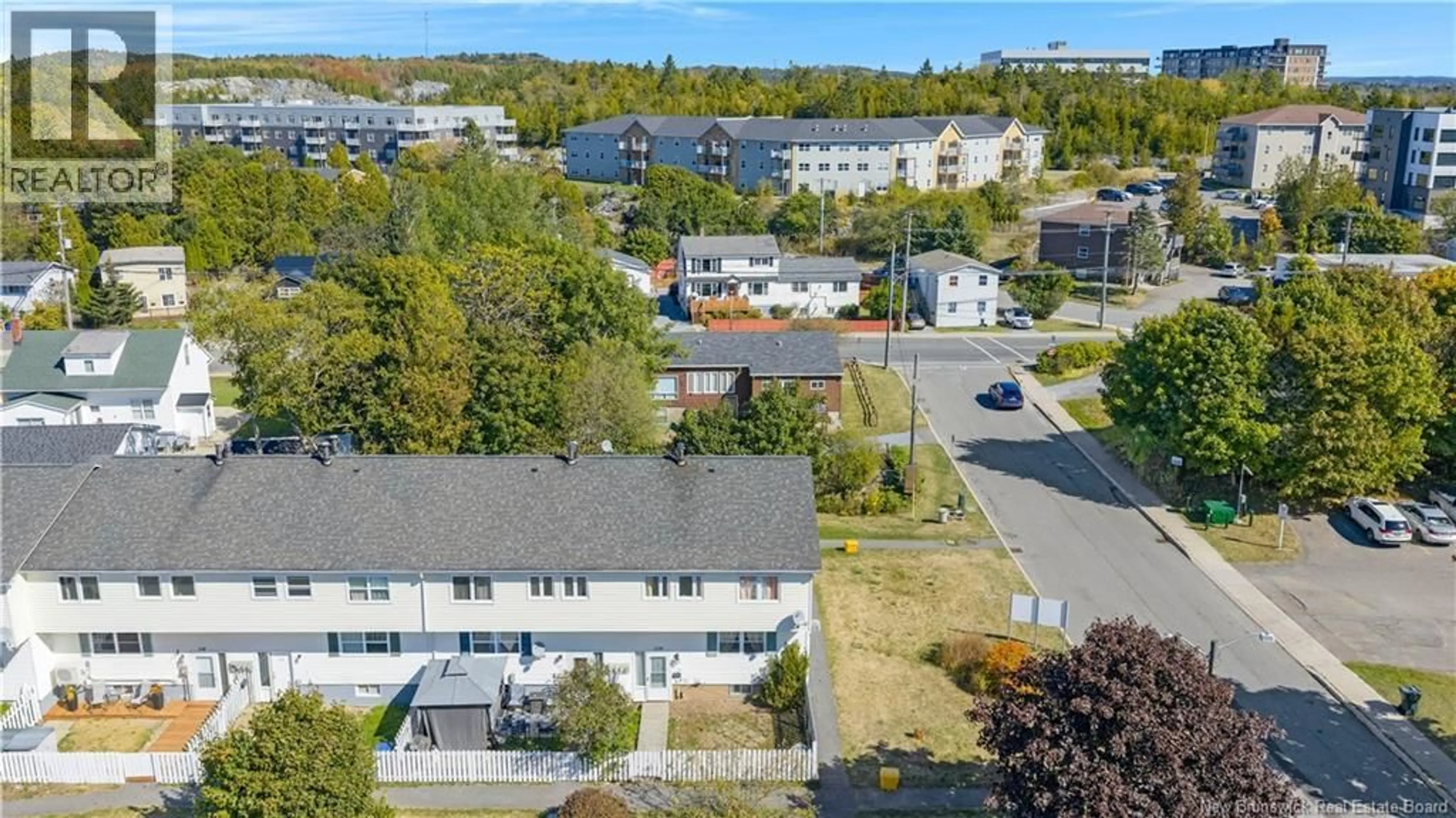 A pic from outside/outdoor area/front of a property/back of a property/a pic from drone, unknown for 124 TARTAN STREET, Saint John New Brunswick E2K2R7