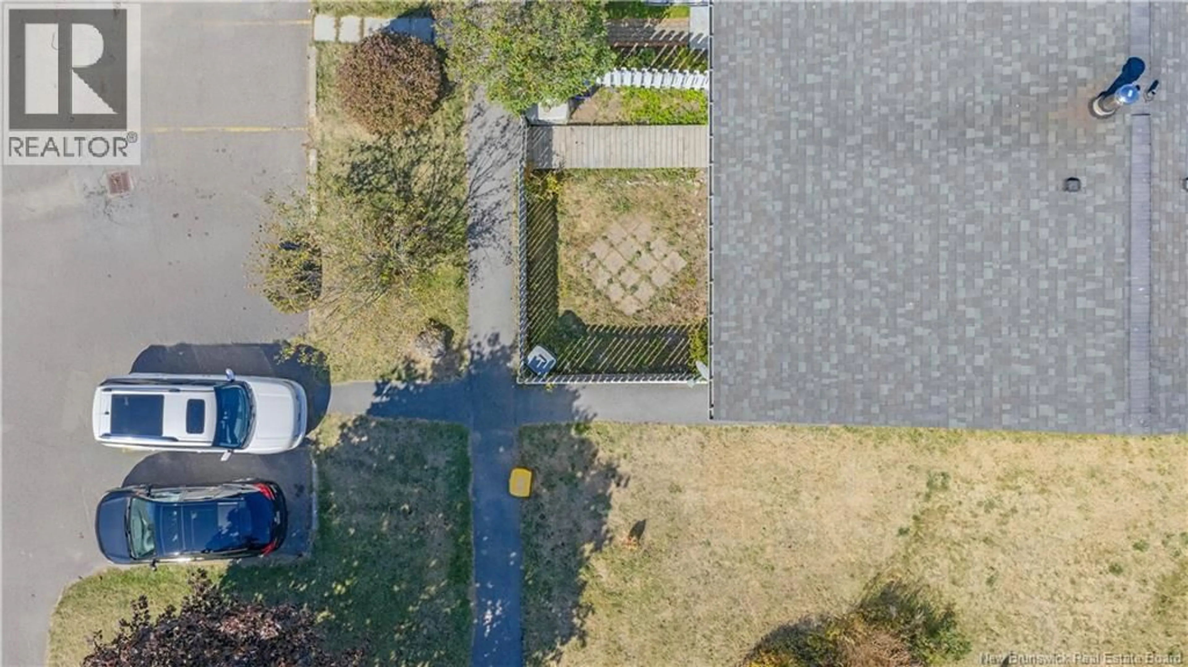 A pic from outside/outdoor area/front of a property/back of a property/a pic from drone, street for 124 TARTAN STREET, Saint John New Brunswick E2K2R7
