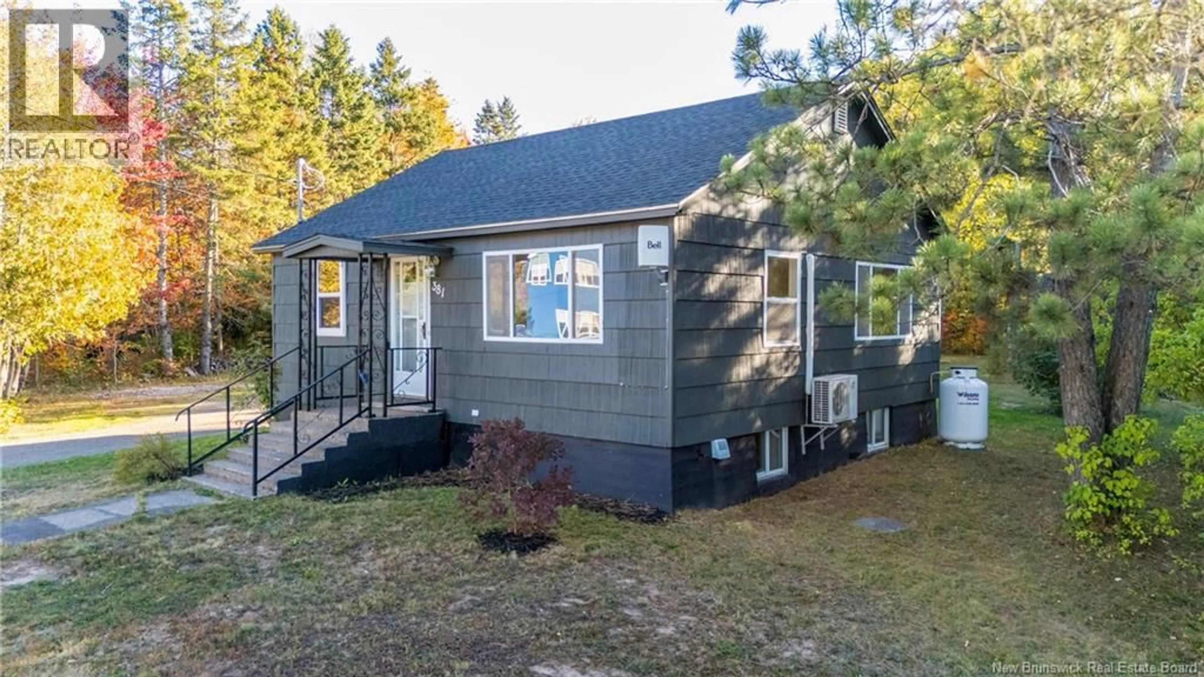 Home with vinyl exterior material, street for 381 CALEDONIA ROAD, Moncton New Brunswick E1H2E8