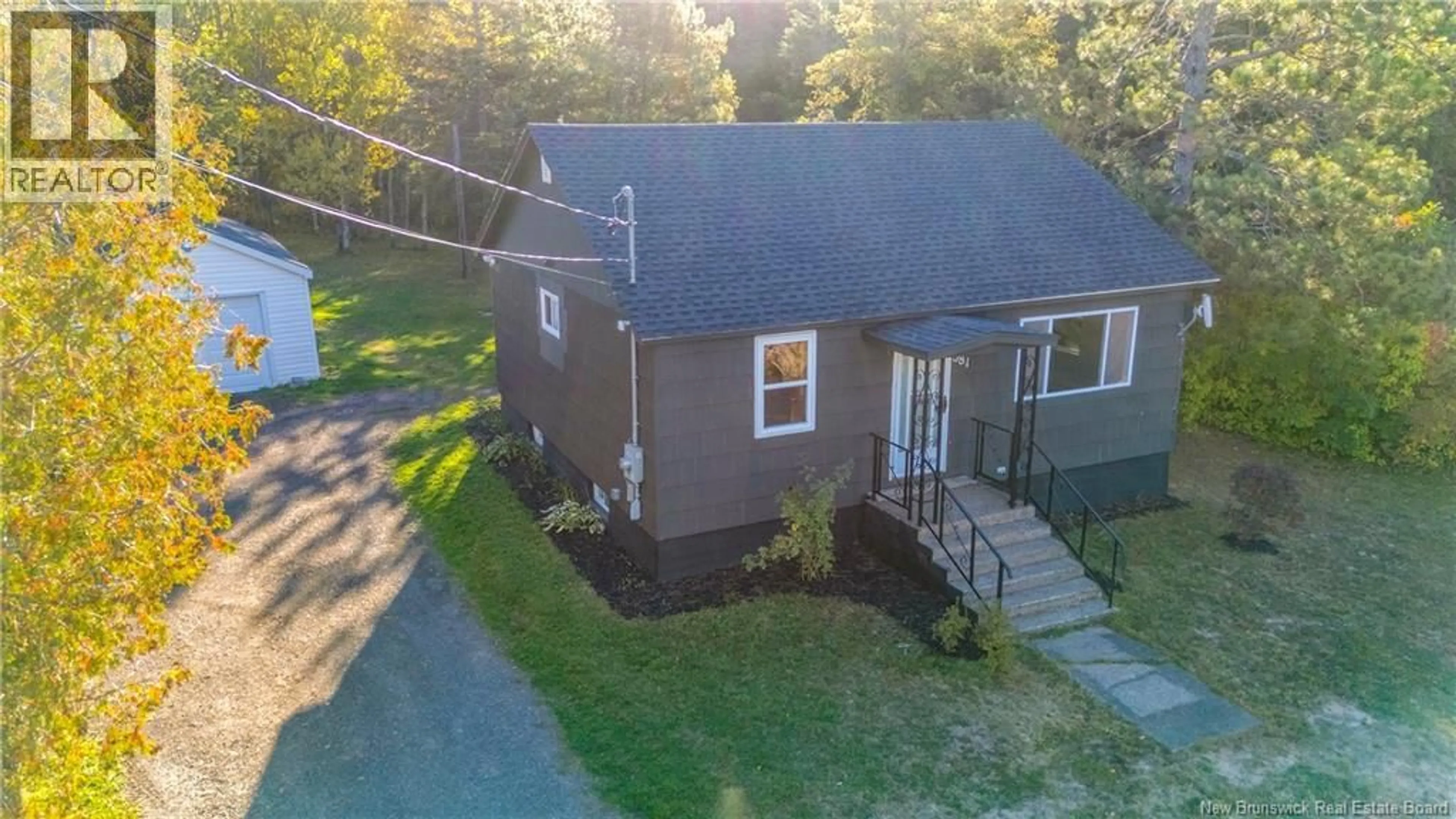 A pic from outside/outdoor area/front of a property/back of a property/a pic from drone, street for 381 CALEDONIA ROAD, Moncton New Brunswick E1H2E8
