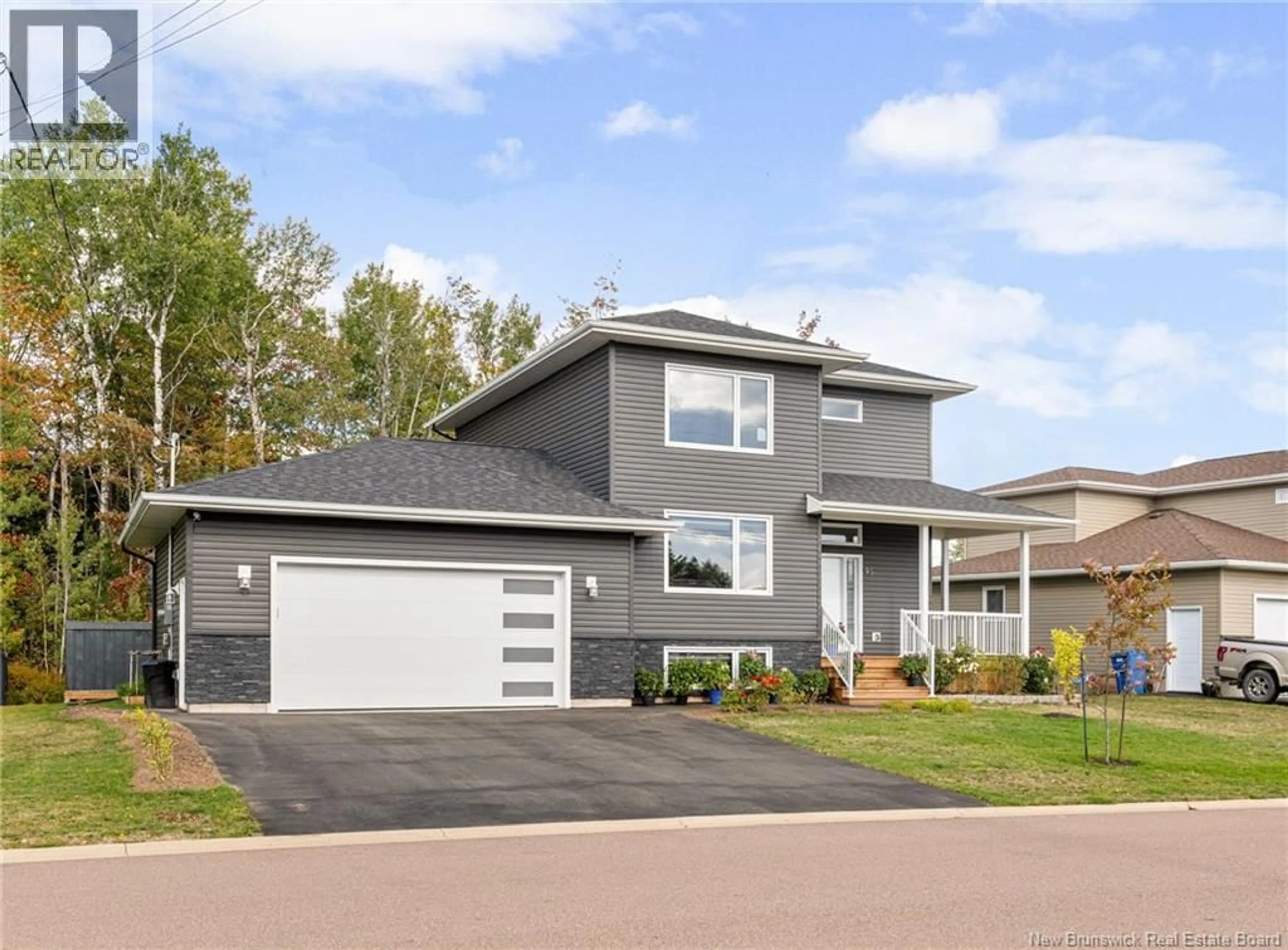 Home with vinyl exterior material, street for 95 SATARA DRIVE, Moncton New Brunswick E1G6A5
