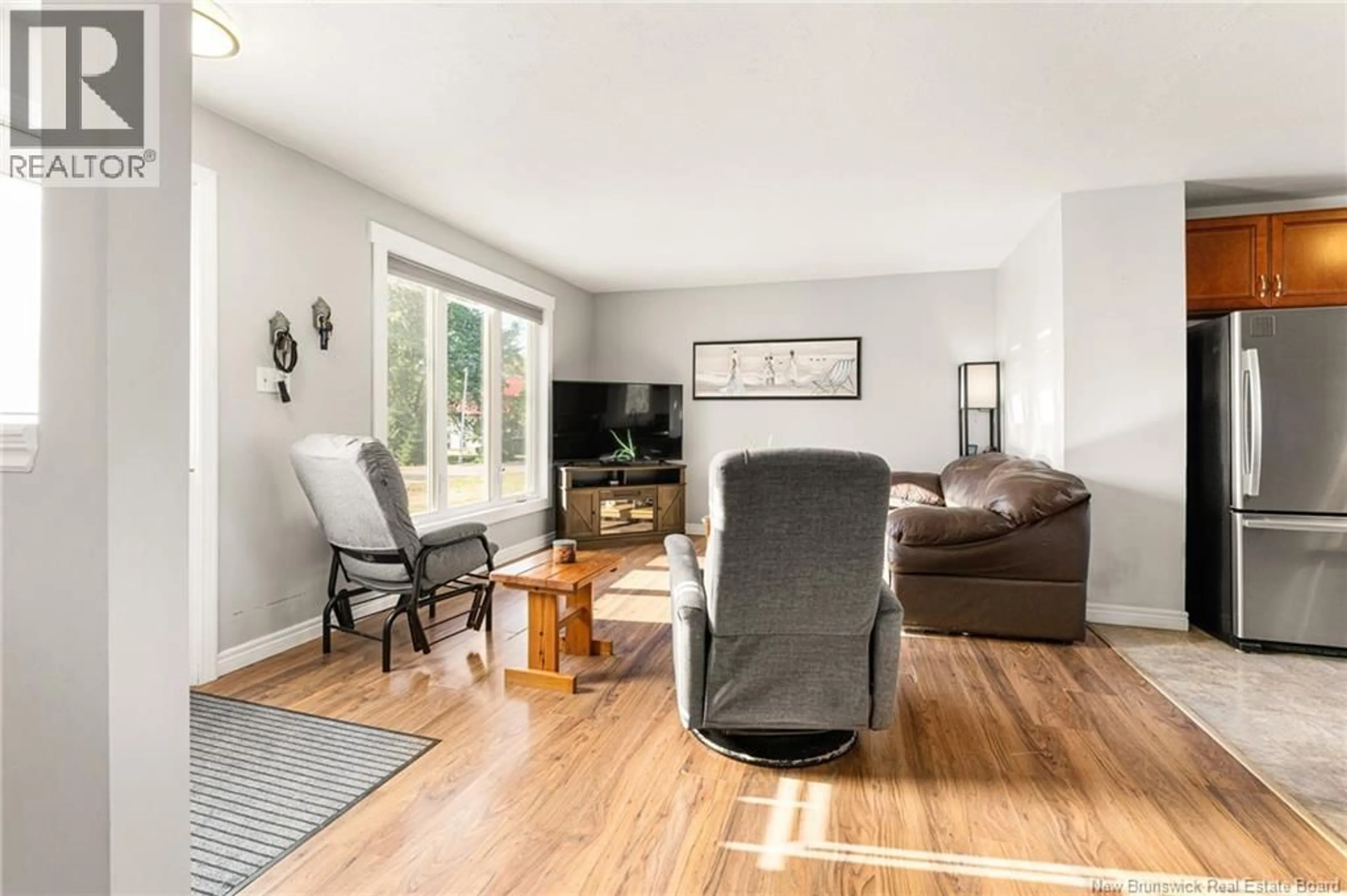 Living room with furniture, wood/laminate floor for 98 WINTER STREET, Shediac New Brunswick E4P2Y2