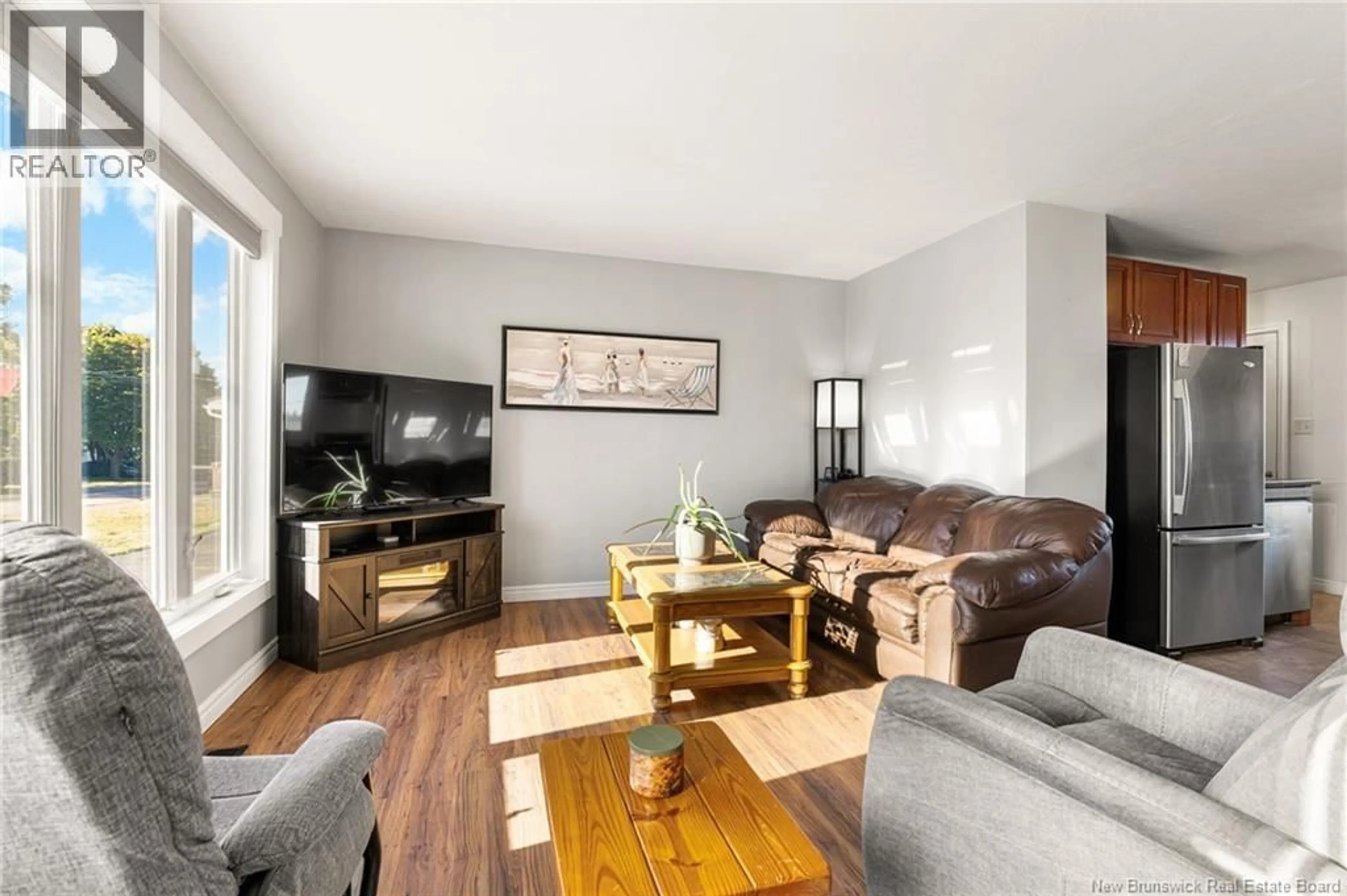 Living room with furniture, wood/laminate floor for 98 WINTER STREET, Shediac New Brunswick E4P2Y2