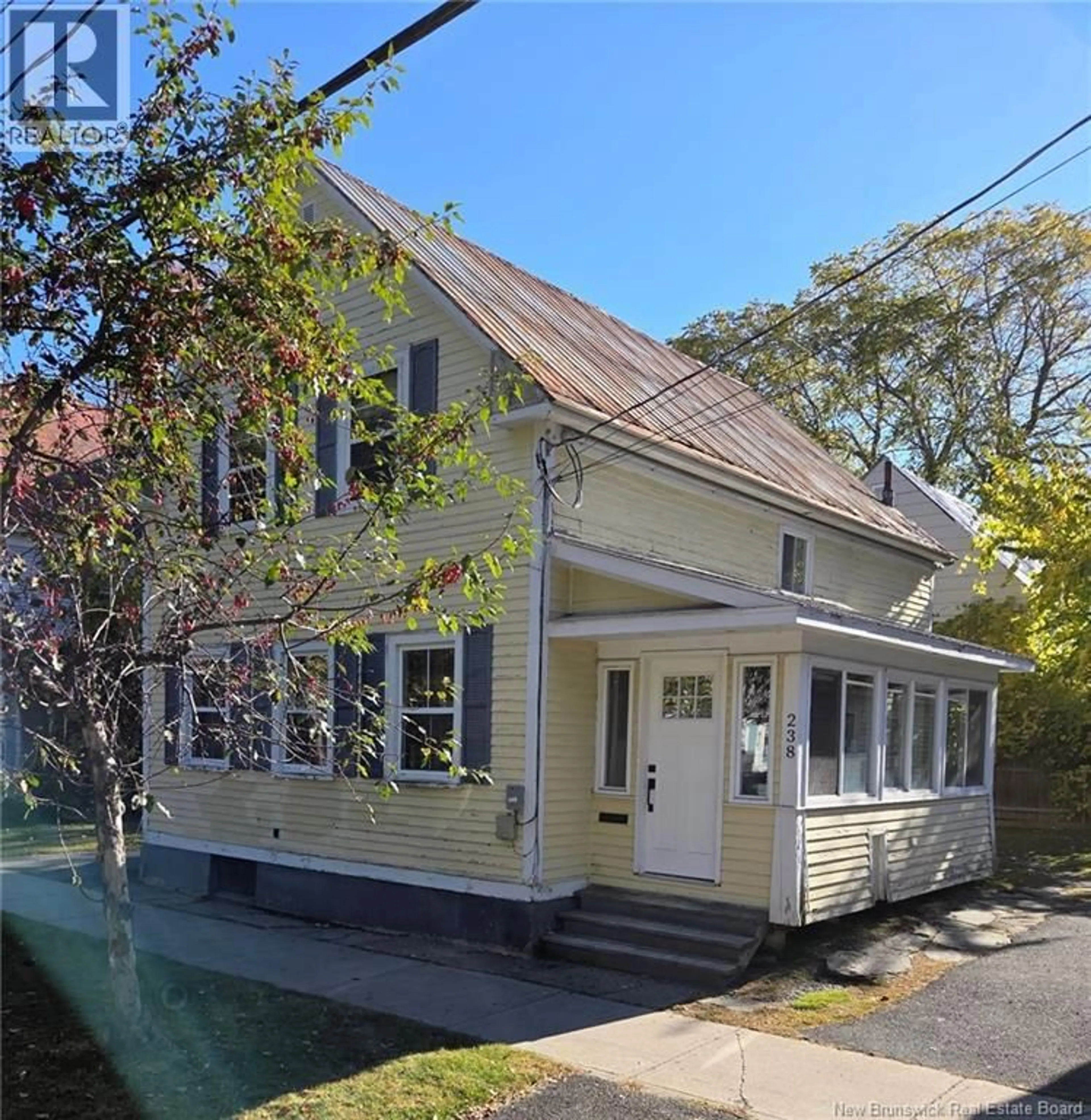 Home with vinyl exterior material, street for 238 CARLETON STREET, Fredericton New Brunswick E3B3T6