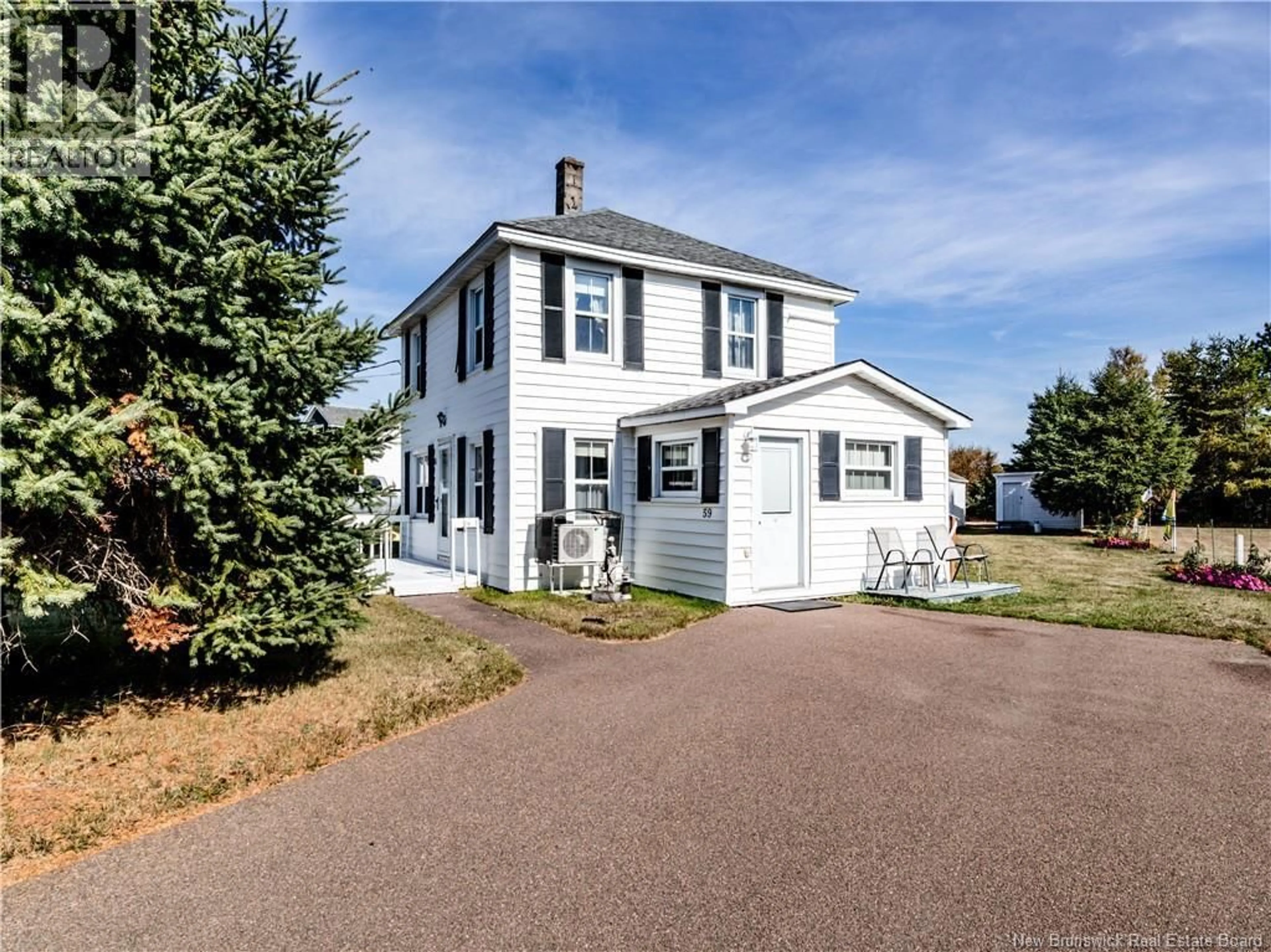 Home with vinyl exterior material, street for 59 BELLEVUE STREET, Saint-Louis-De-Kent New Brunswick E4X1B3