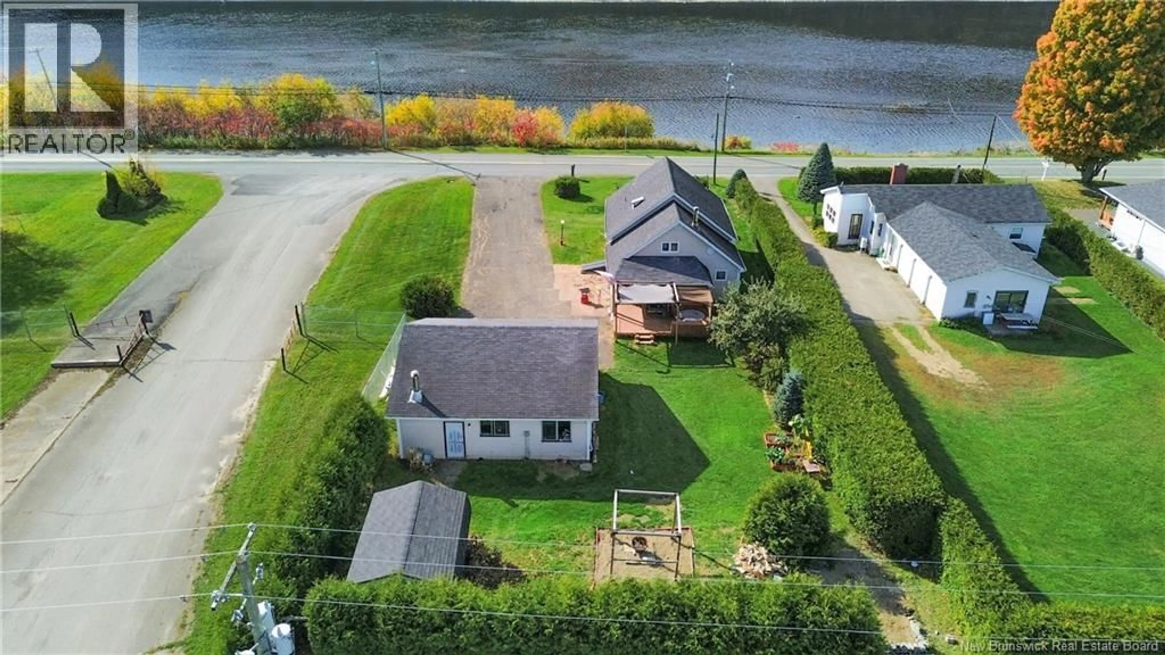 A pic from outside/outdoor area/front of a property/back of a property/a pic from drone, water/lake/river/ocean view for 8588 MAIN STREET, Florenceville-Bristol New Brunswick E7L3G8